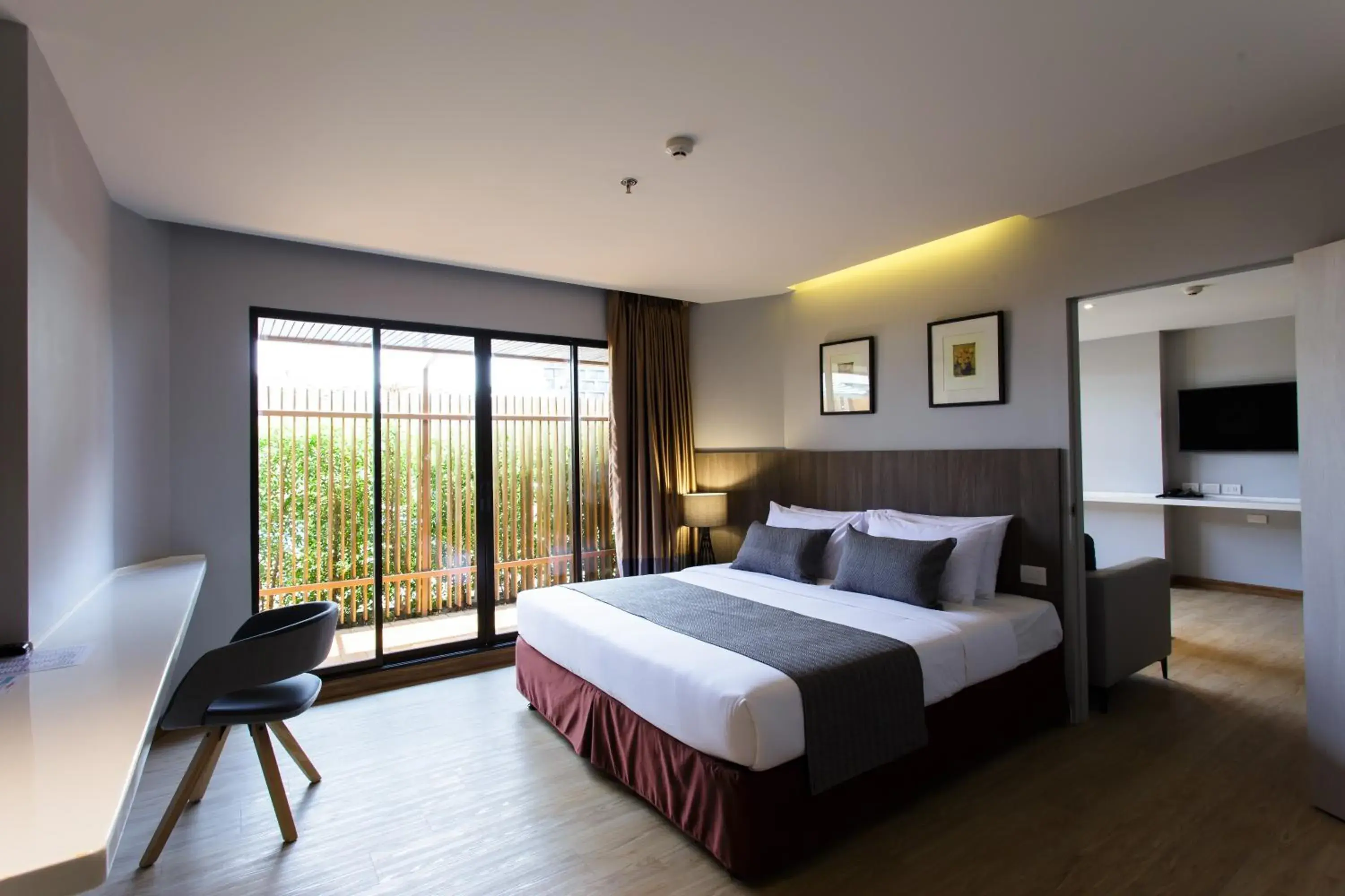 Bedroom in Jazzotel Bangkok- SHA Extra Plus