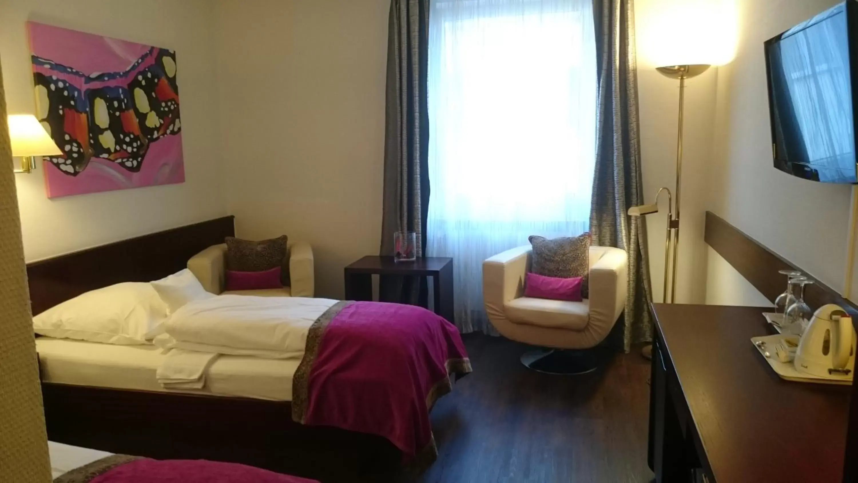 Photo of the whole room, Bed in Central Hotel