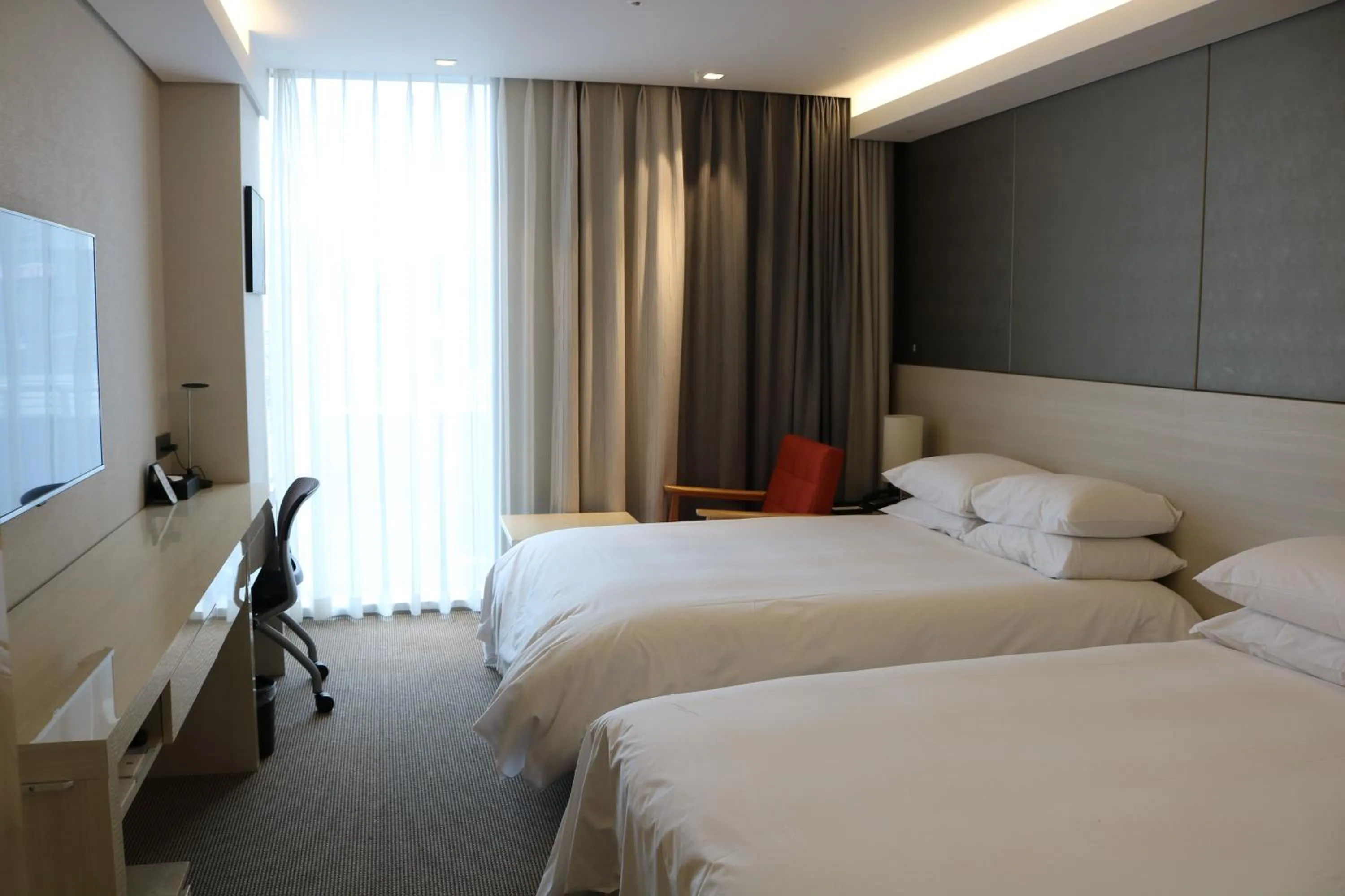 Bed in Hotel Regent Marine The Blue