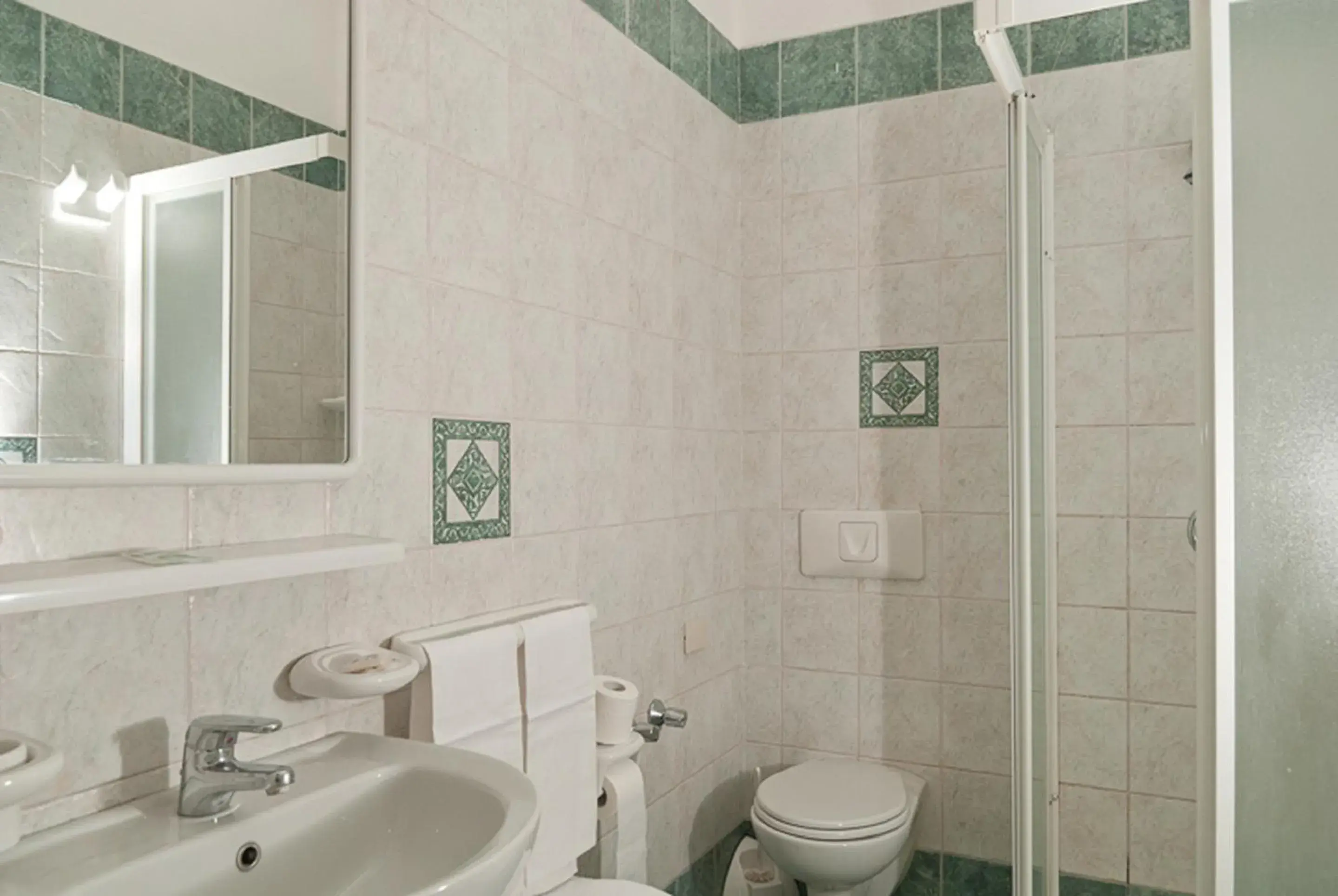 Bathroom in Hotel Del Postiglione Bathroom in Hotel Del Postiglione