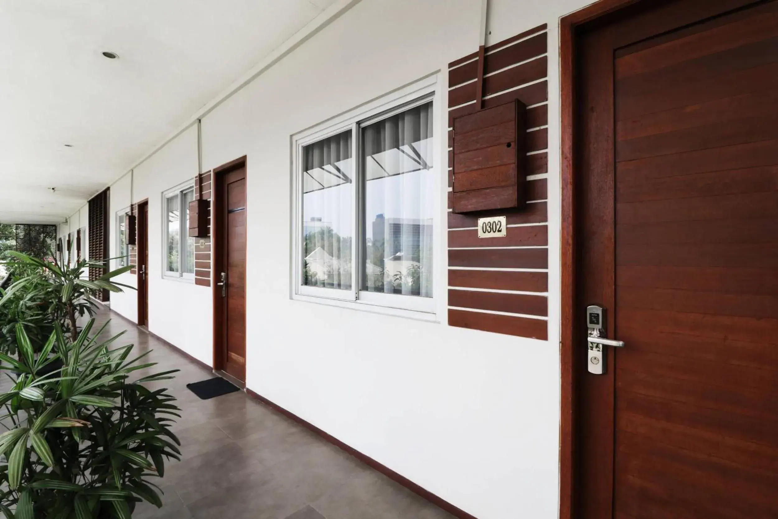 Facade/entrance in Pejaten Valley Residence