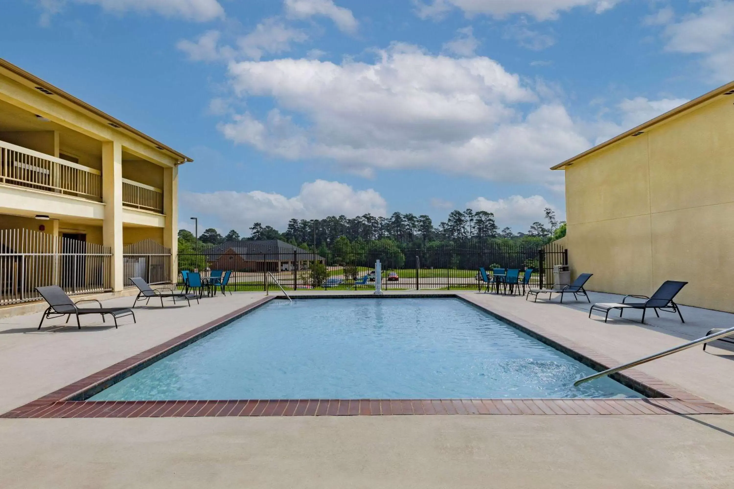 Pool view, Swimming Pool in Days Inn & Suites by Wyndham Huntsville