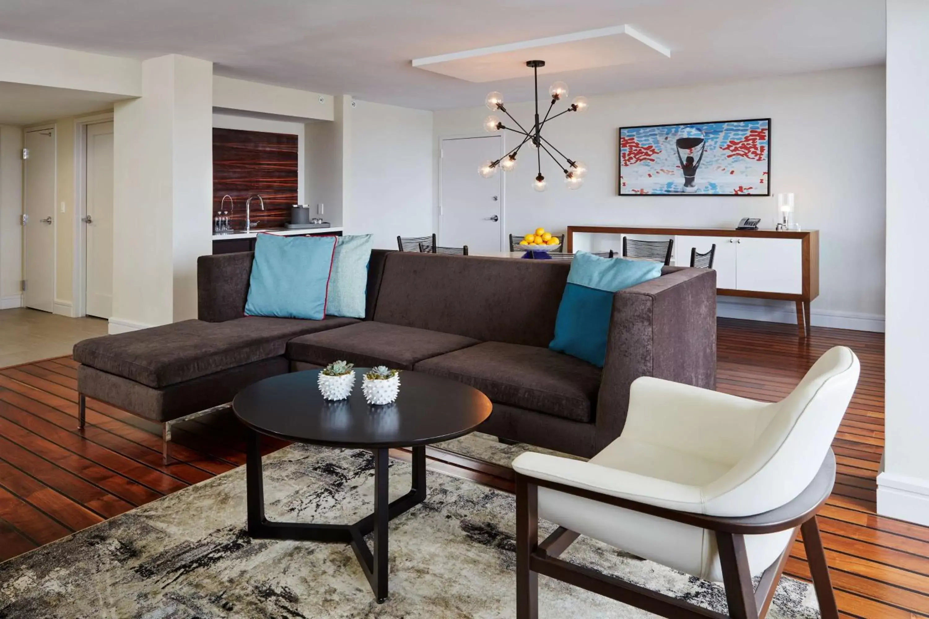 Living room, Seating Area in Waterstone Resort & Marina Boca Raton, Curio Collection by Hilton