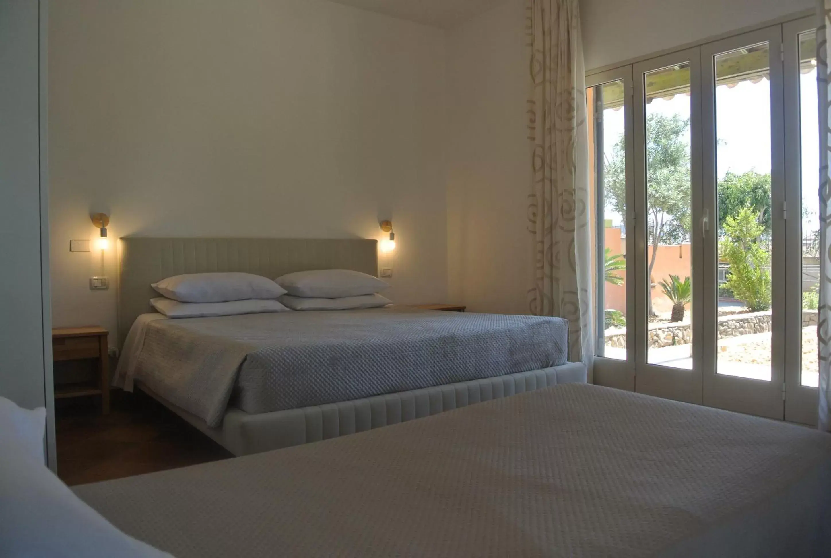 Bedroom, Bed in Villa Carlotta Resort