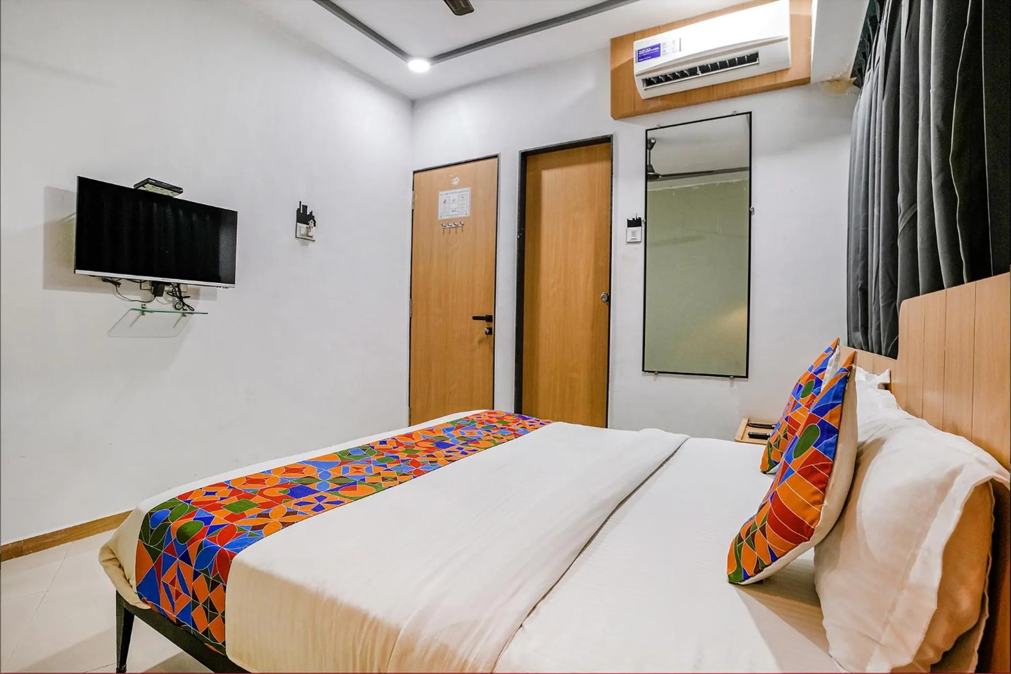 Bedroom in FabHotel Saarthi Inn