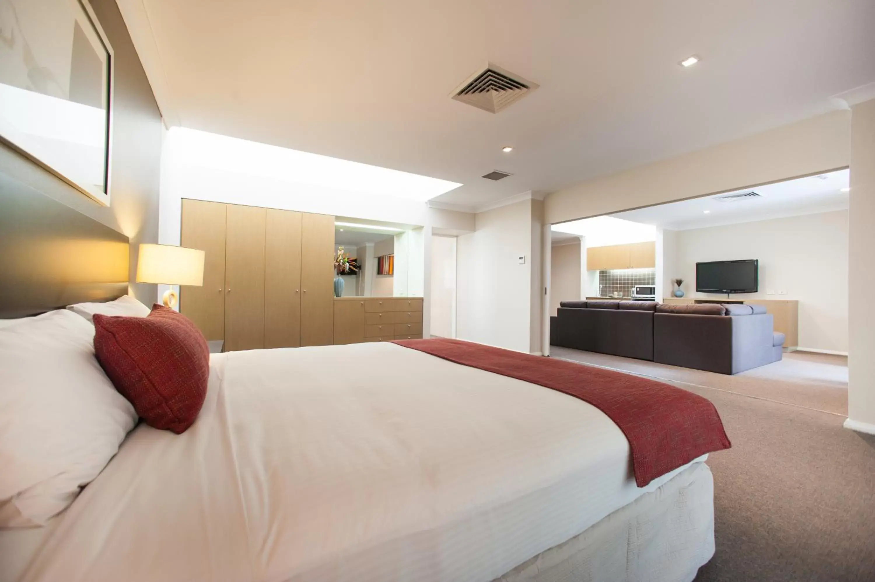 Photo of the whole room, Bed in Ramada Hotel & Suites by Wyndham Cabramatta