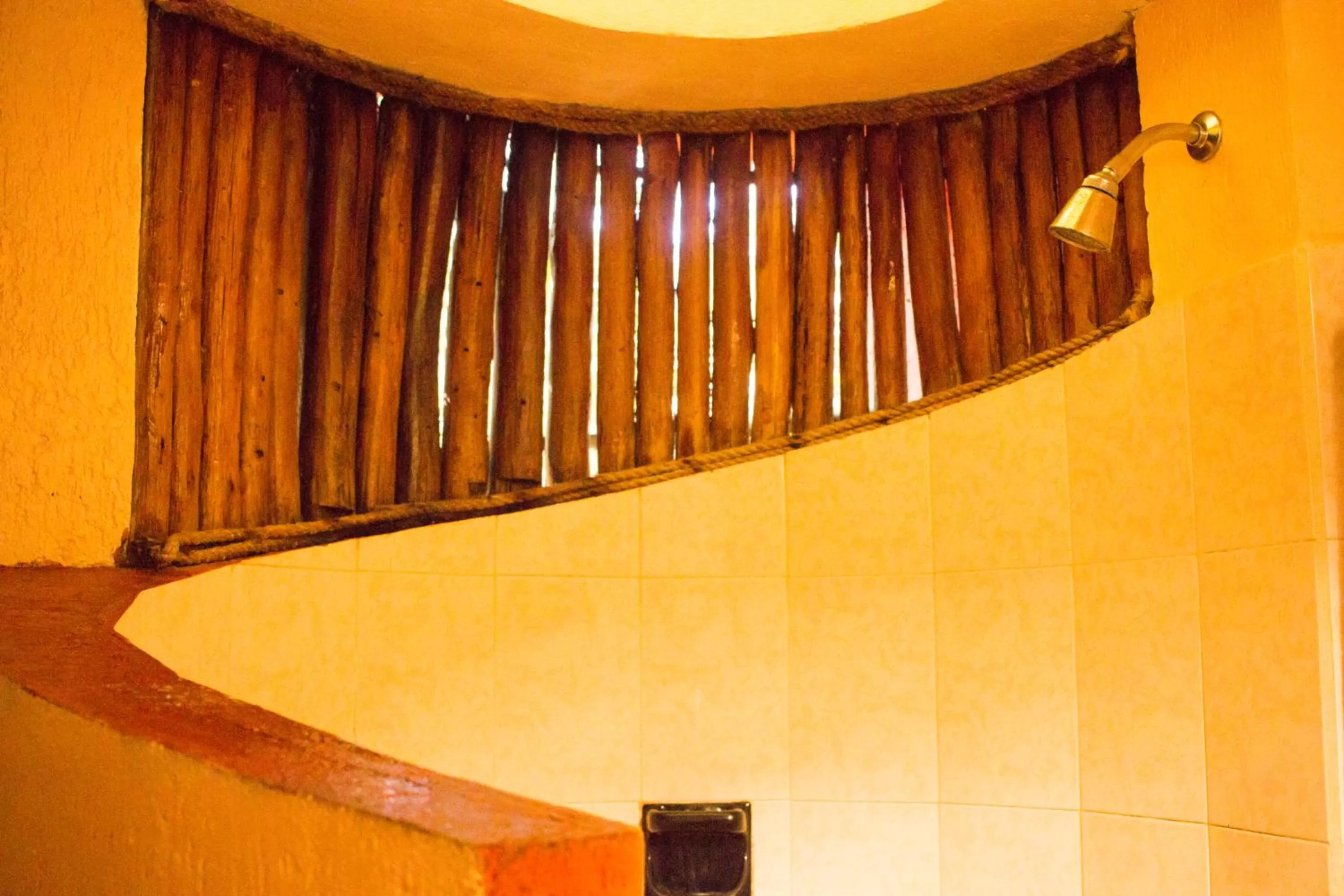 Bathroom in Cocos Cabañas Playa del Carmen Adults Only