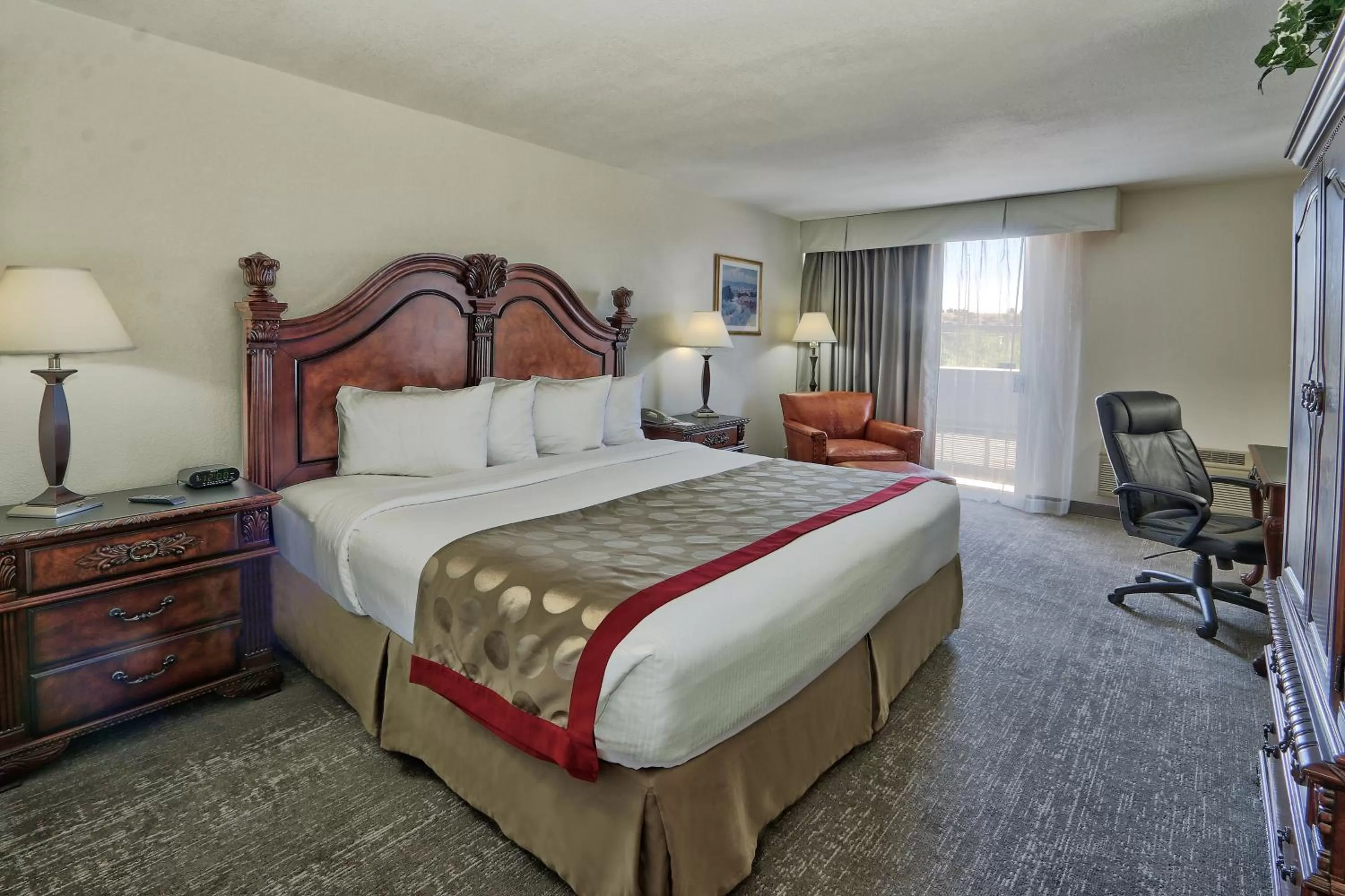 Bed in Ramada by Wyndham Albuquerque Midtown