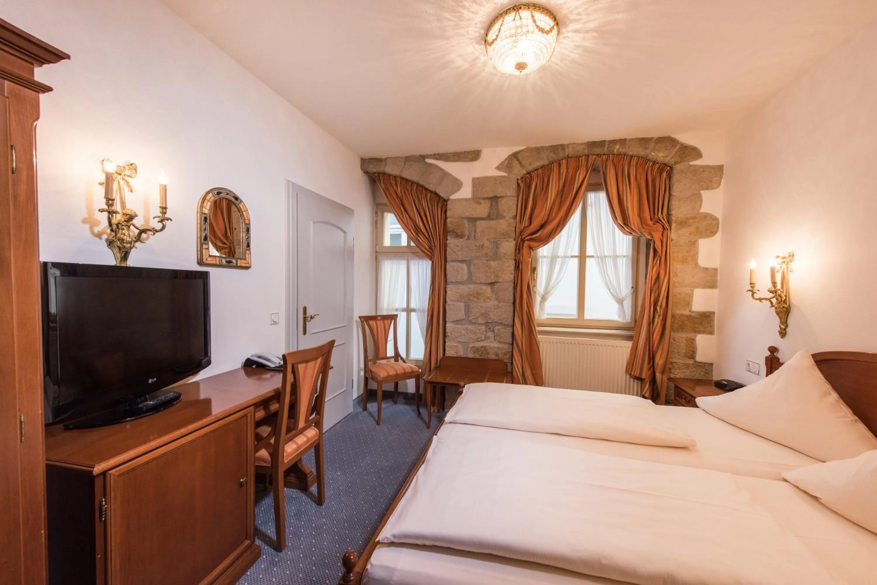 Photo of the whole room, Bed in Hotel Goldener Löwe