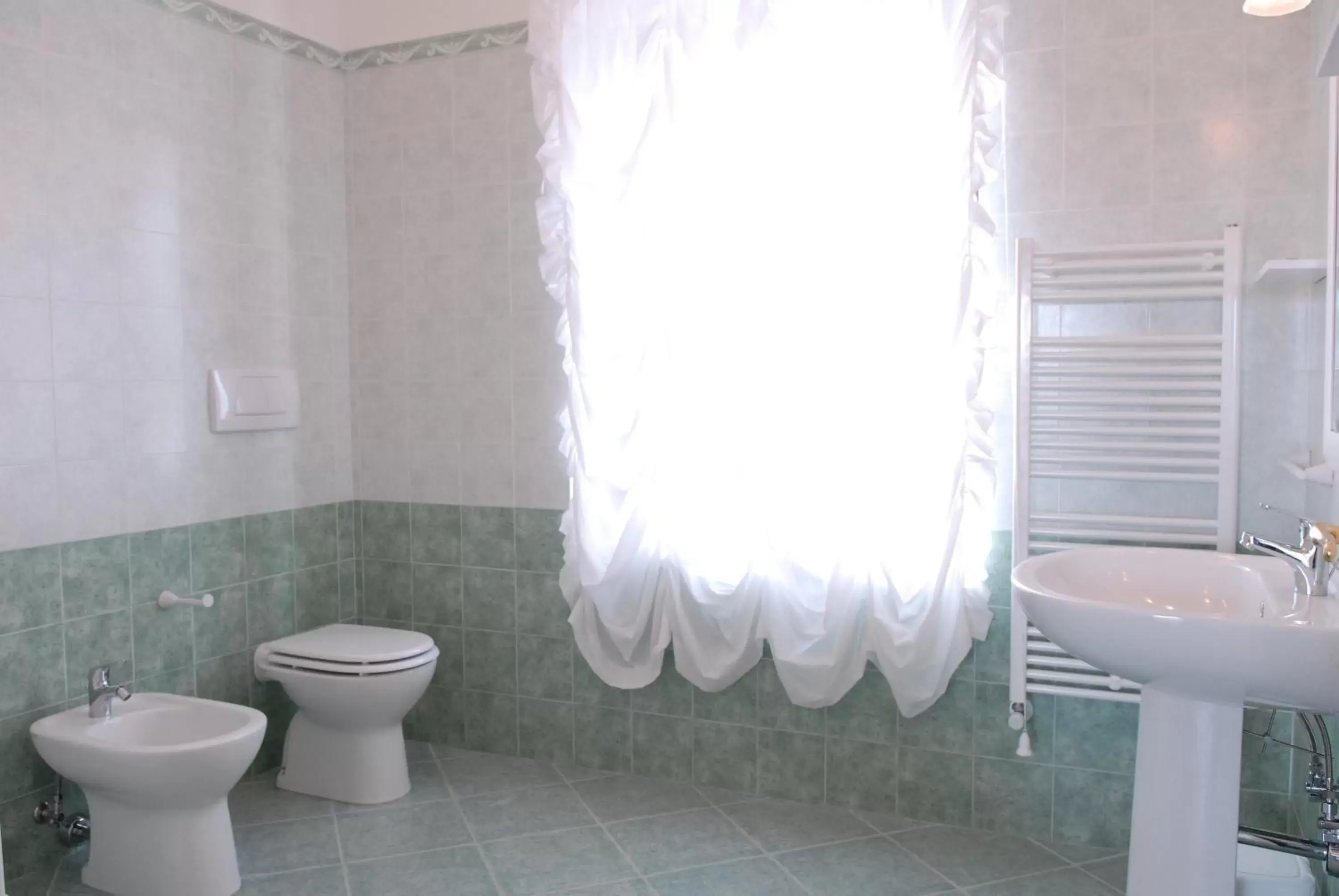 Toilet, Bathroom in Villa Caramia