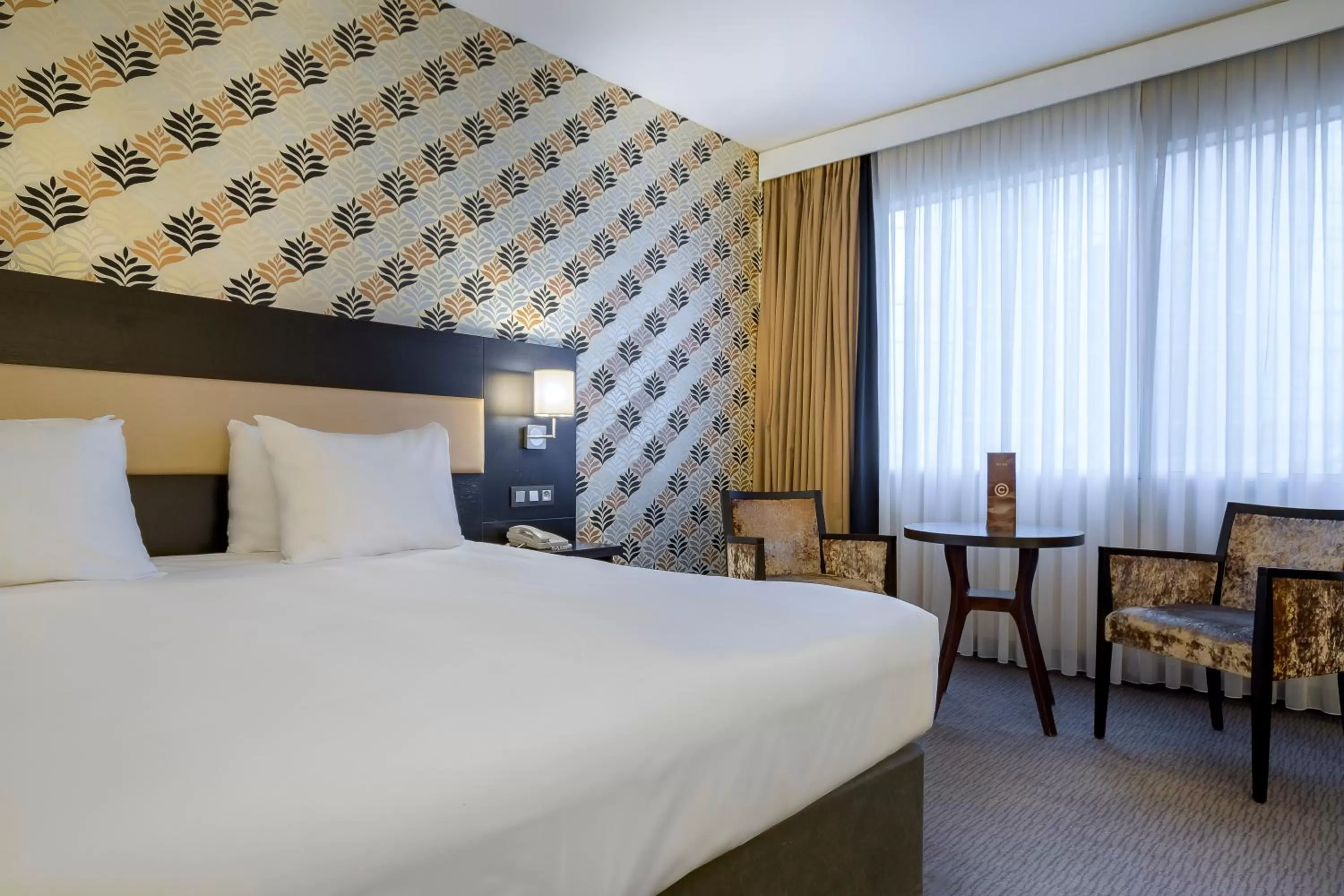 Photo of the whole room, Bed in Mercure Antwerp City South