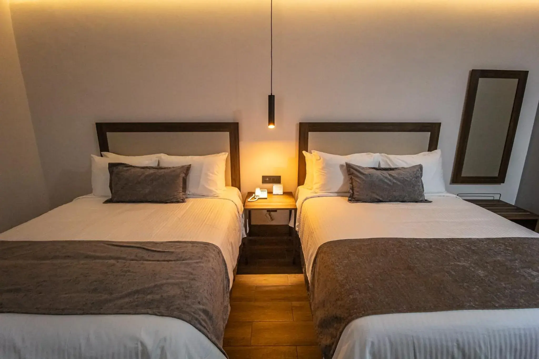 Bed in Hoteles Piedra Alta by De Los Perez