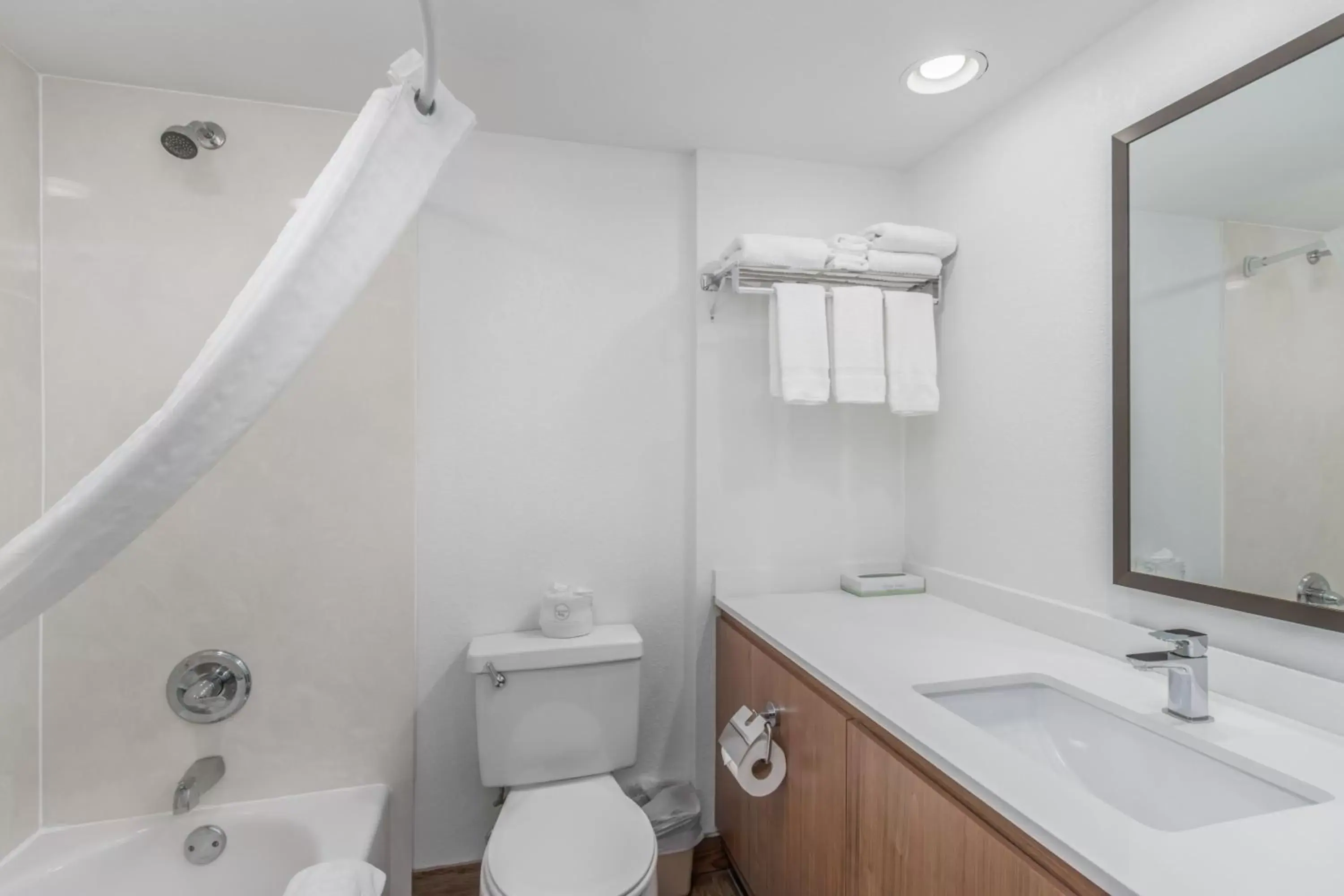 Bathroom in Crossroads Inn & Suites