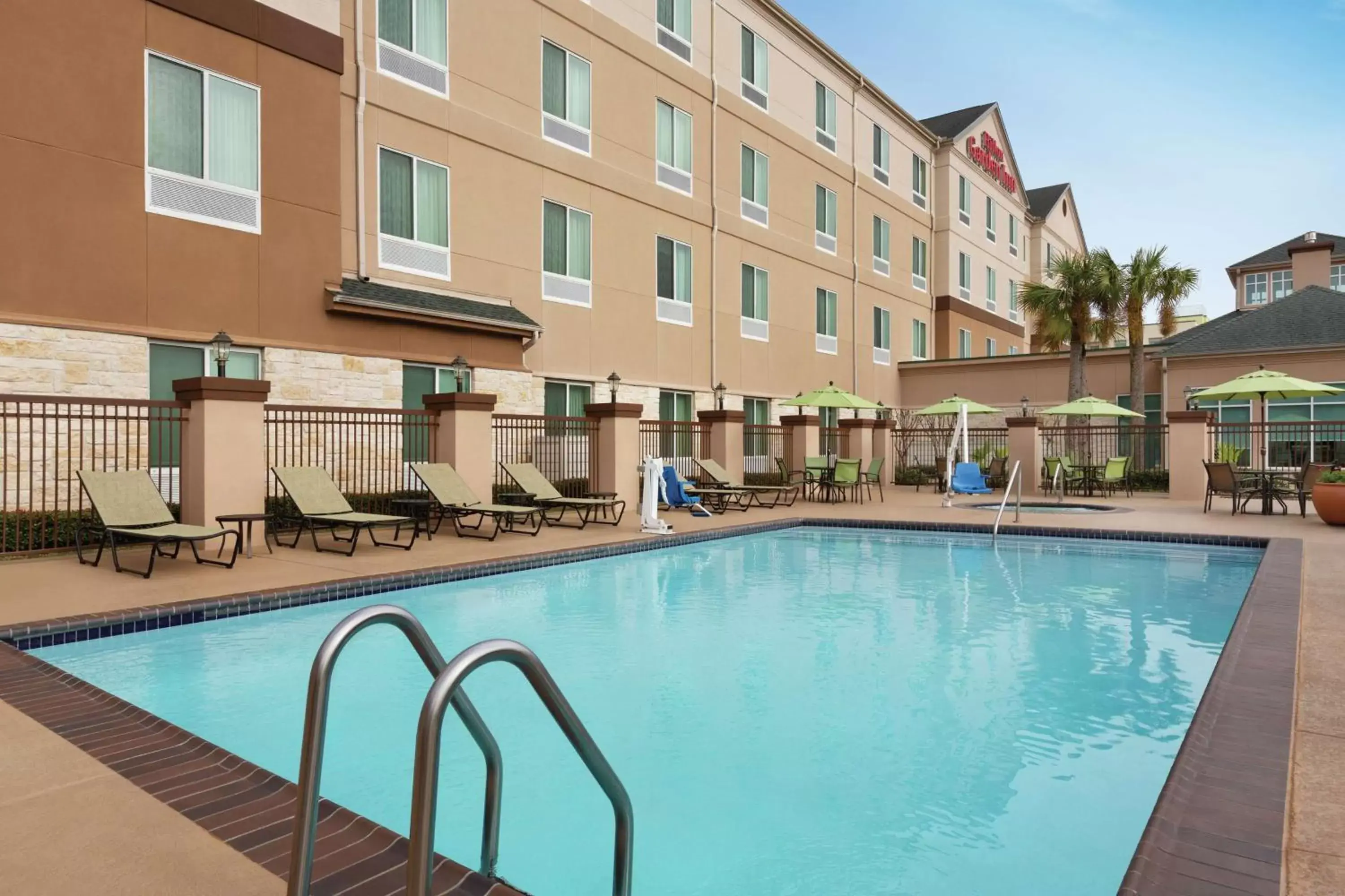 Pool view, Property Building in Hilton Garden Inn Houston/Clear Lake NASA