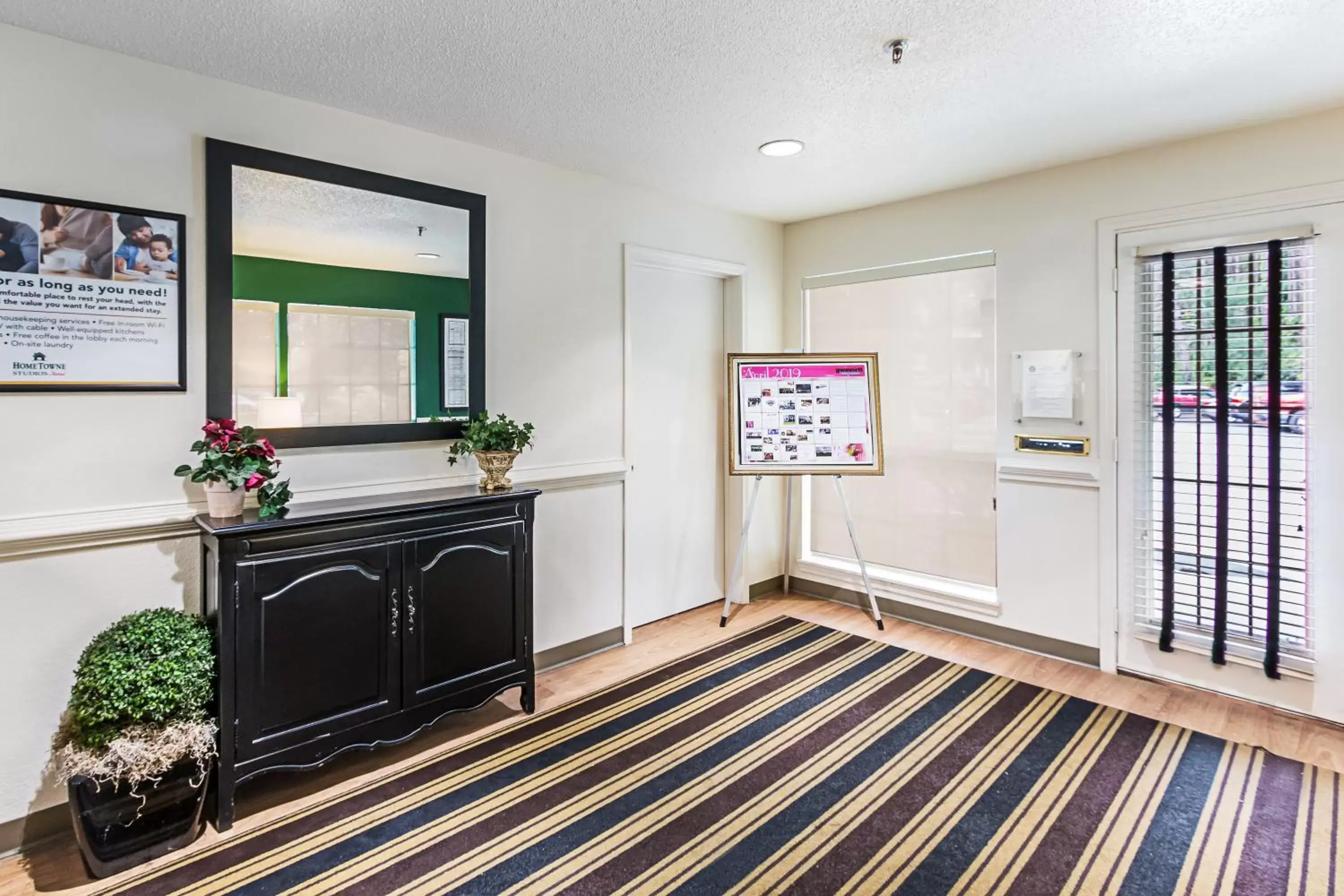 Lobby or reception in HomeTowne Studios by Red Roof Atlanta – Lawrenceville Lobby or reception in HomeTowne Studios by Red Roof Atlanta – Lawrenceville