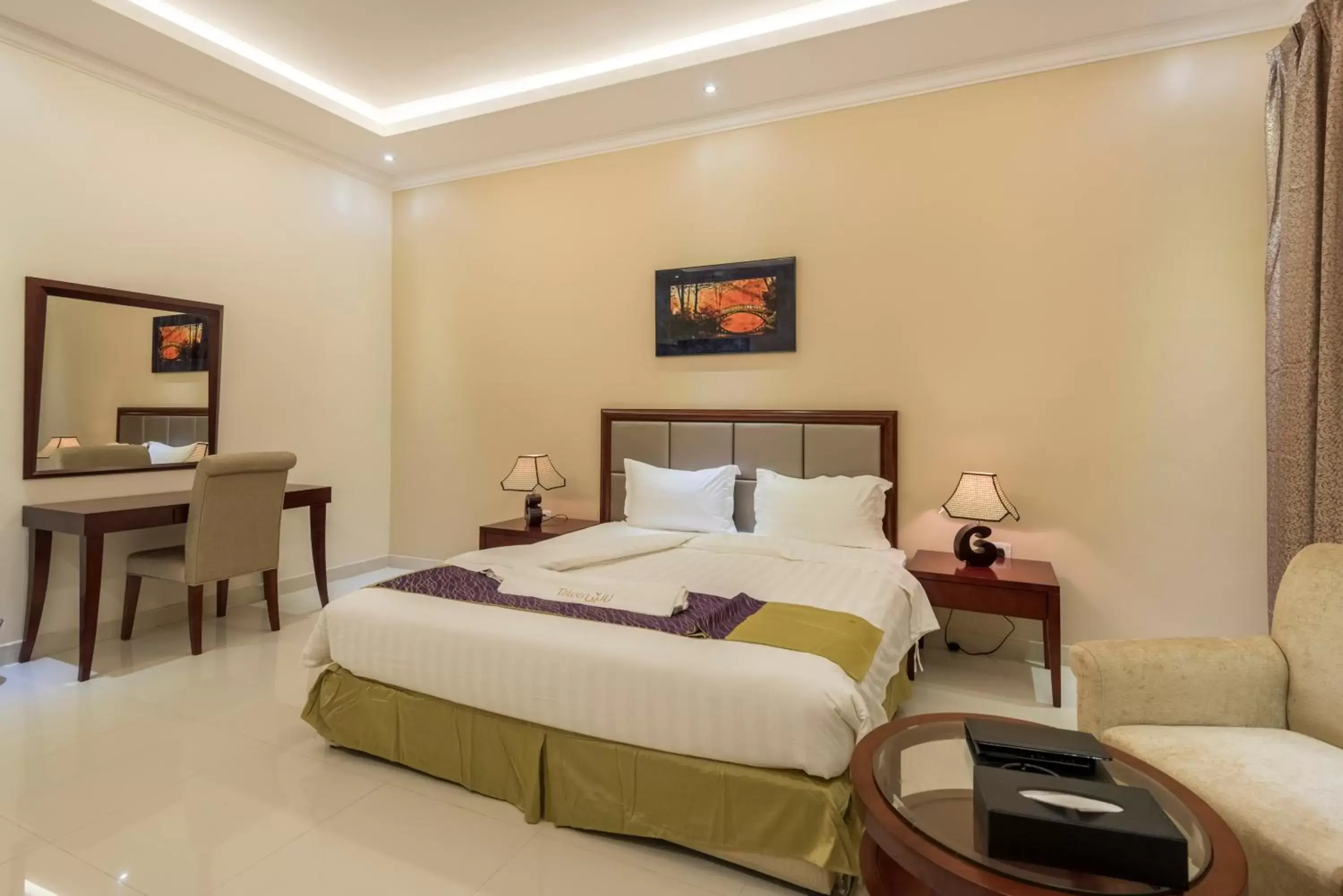 Bed in Taleen Al Nakheel Apartment