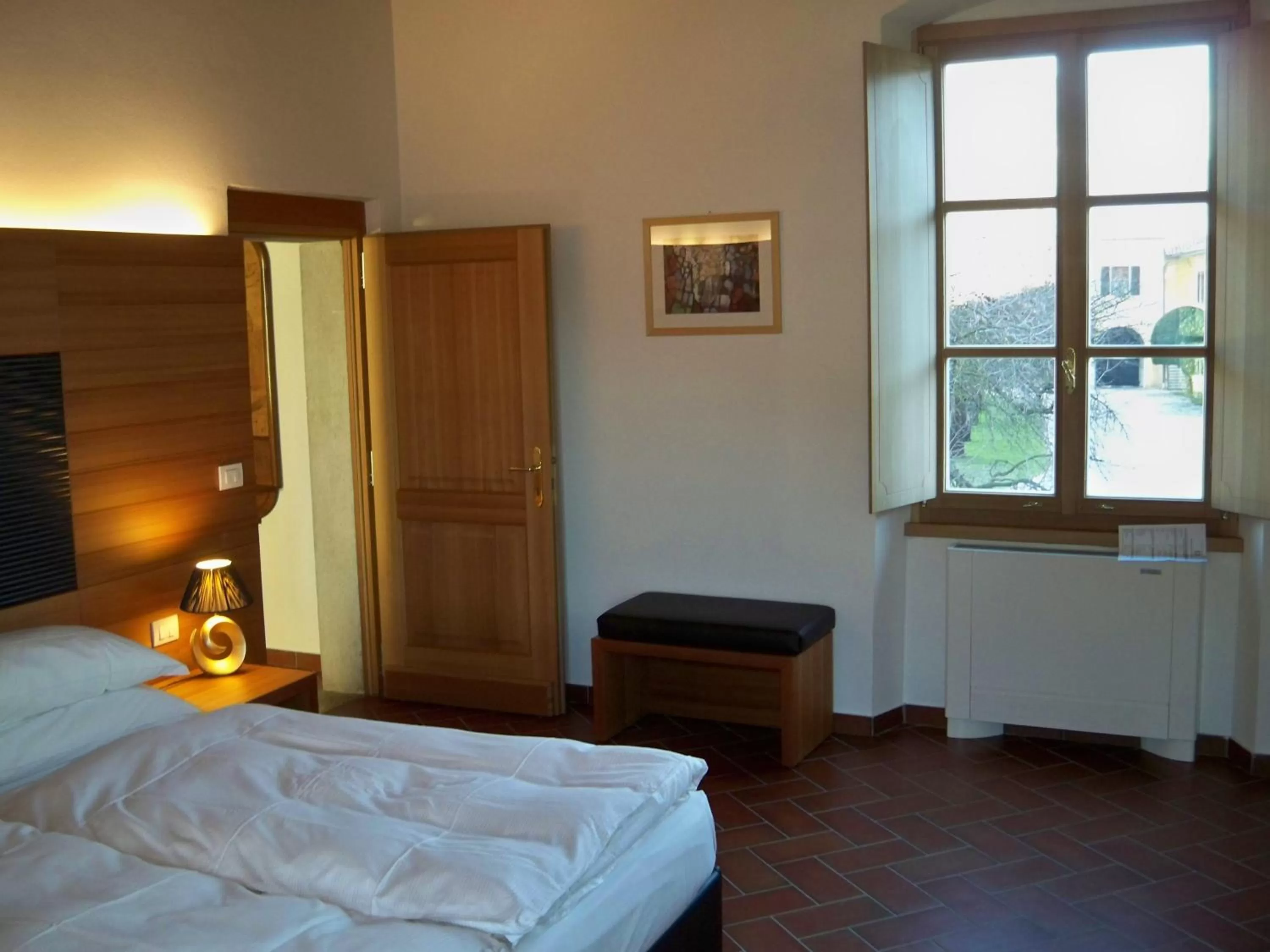 Bed in Relais Palazzo Lodron