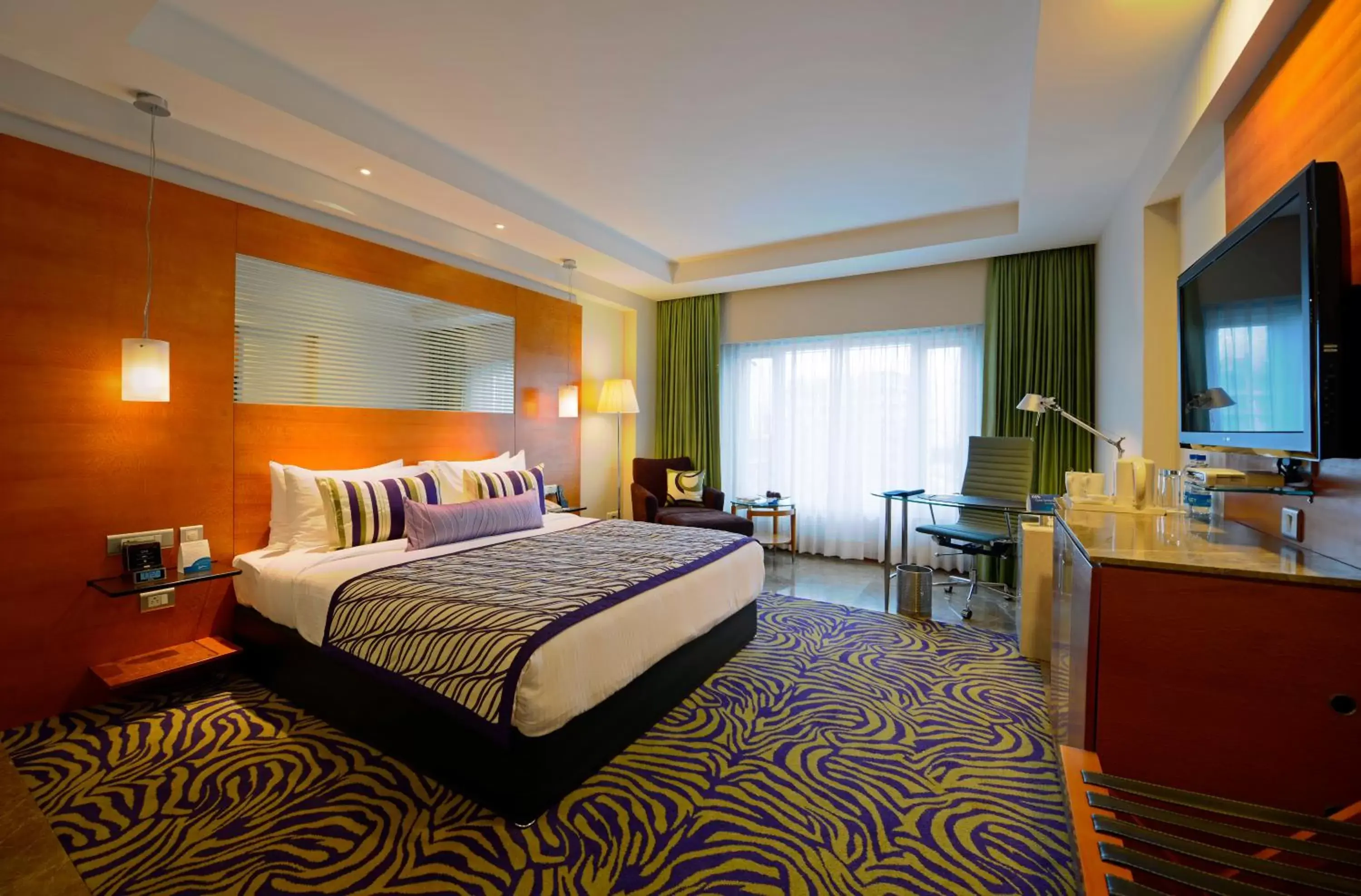 Photo of the whole room, Bed in Radisson Blu Hotel Ahmedabad