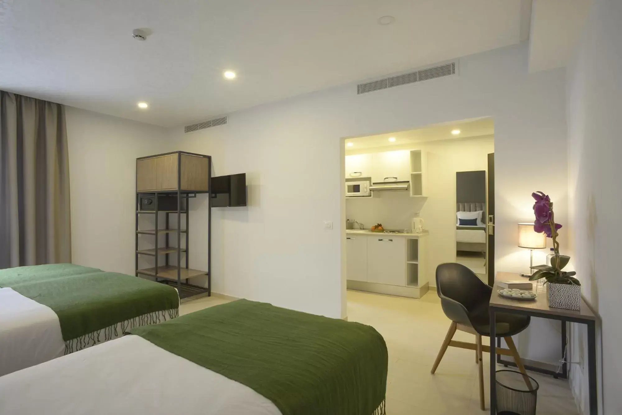 Photo of the whole room, Bed in MAIA HOTEL SUITES Photo of the whole room, Bed in MAIA HOTEL SUITES