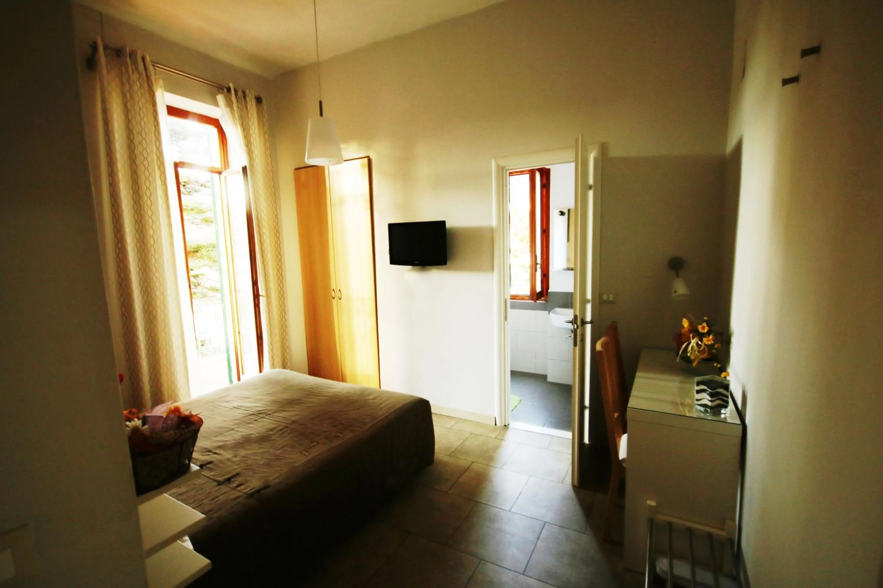 TV and multimedia, Bed in Villa Gina