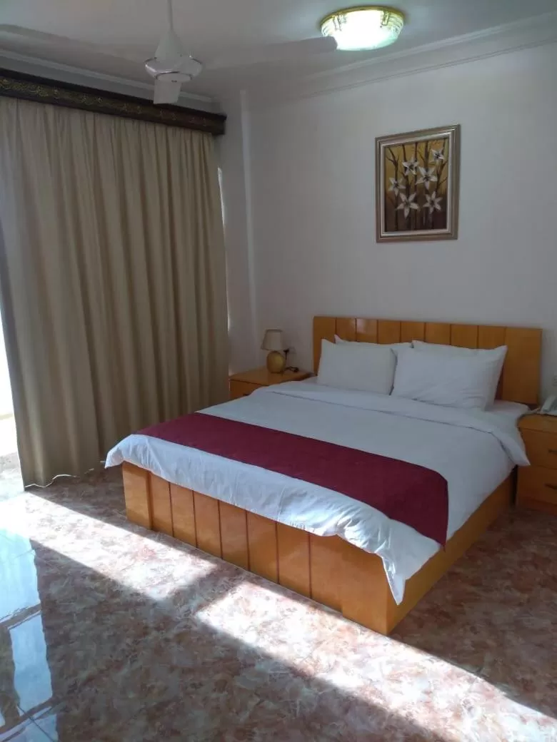 Bed in DREAMLAND HOTEL APARTMENT NIZWA