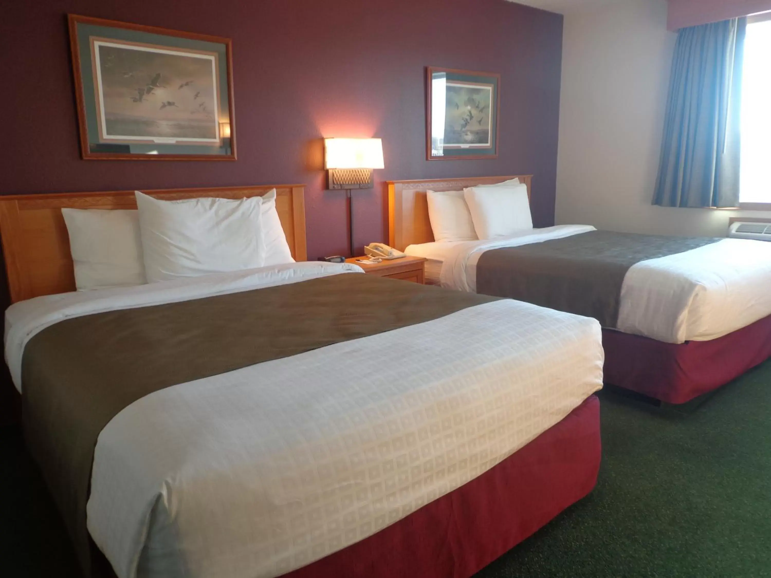 Bed in AmericInn by Wyndham Madison SD Bed in AmericInn by Wyndham Madison SD