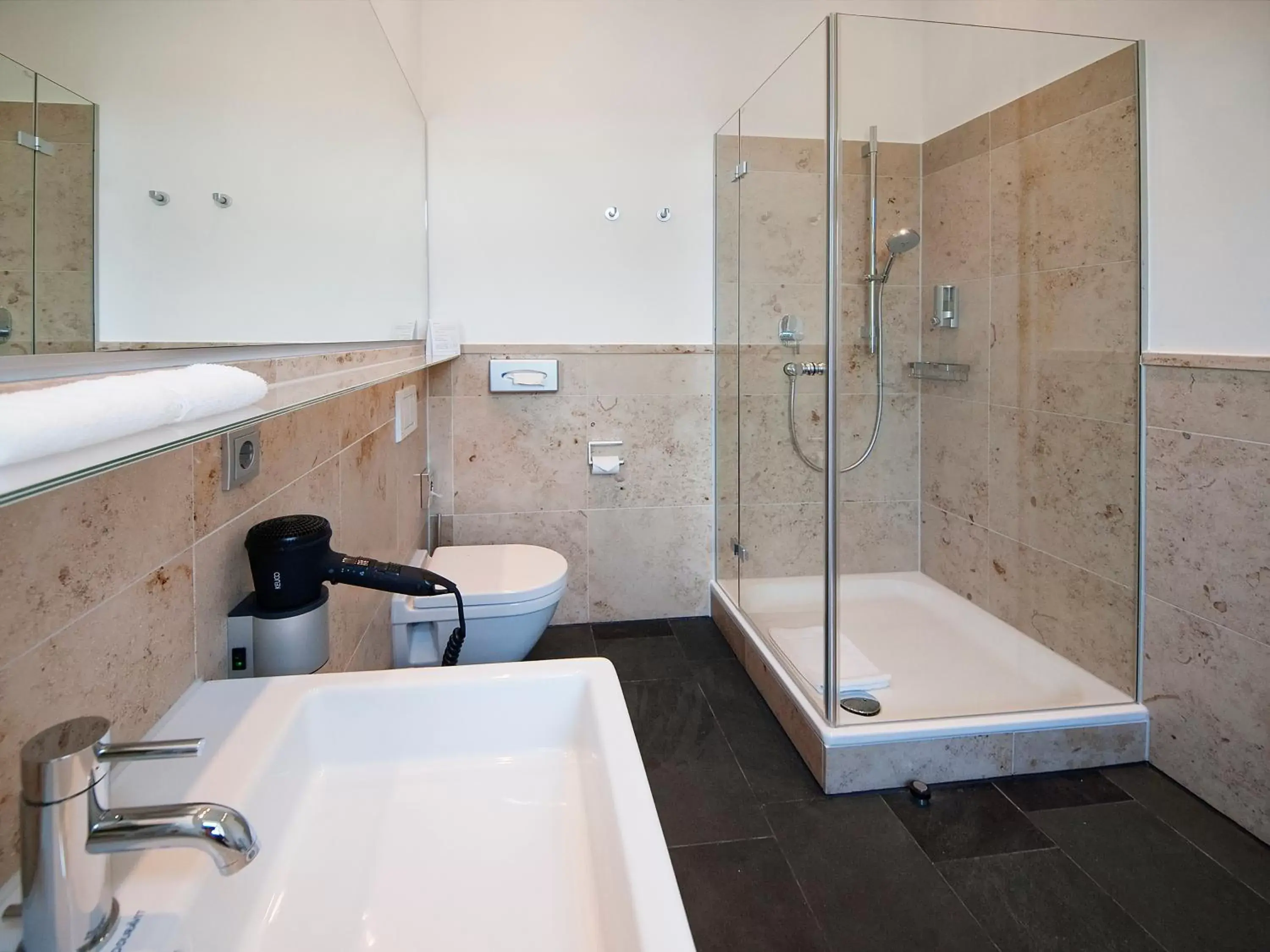 Bathroom in Qube Hotel Bergheim