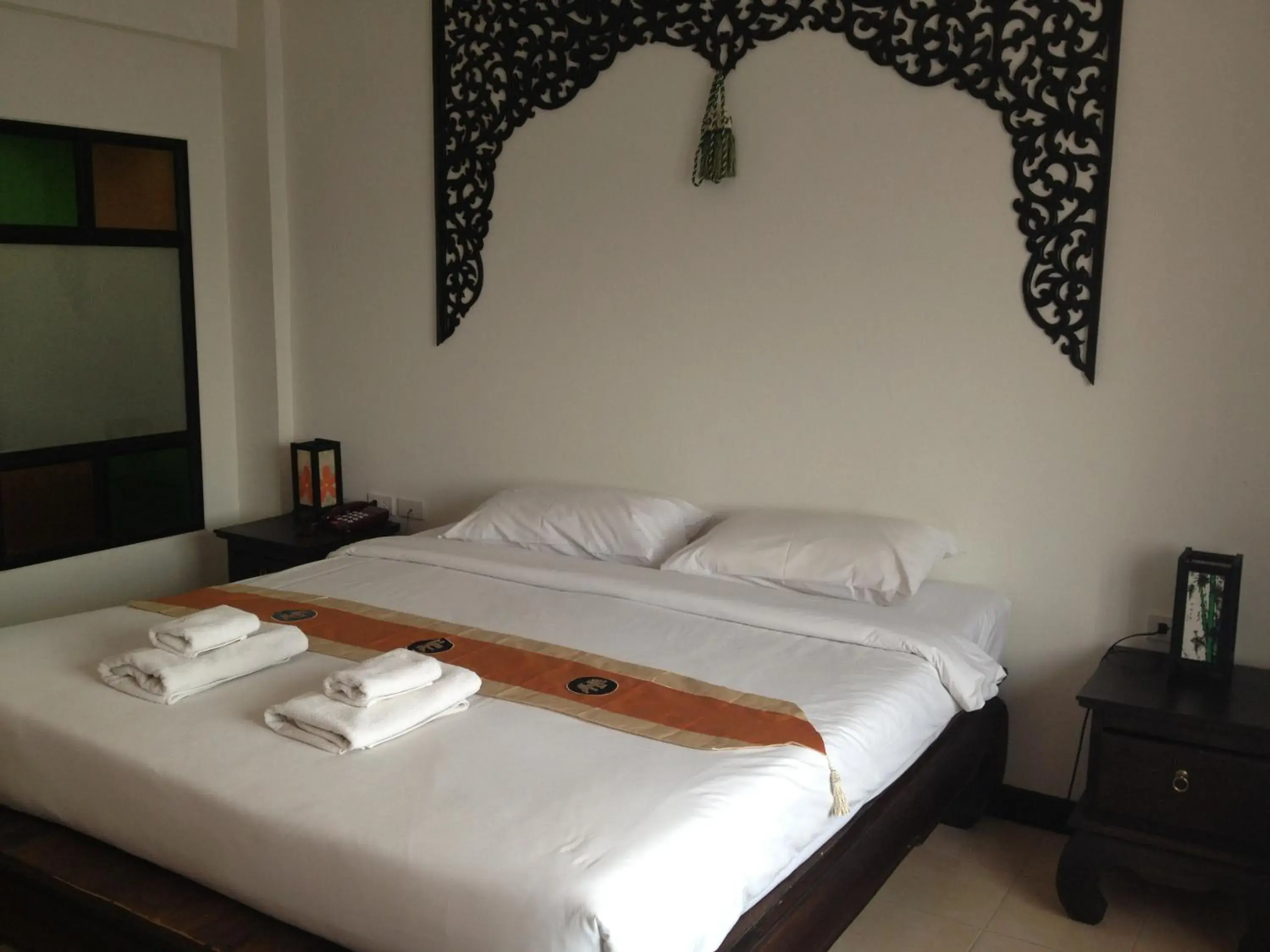 Bed in Wangburapa Grand Hotel