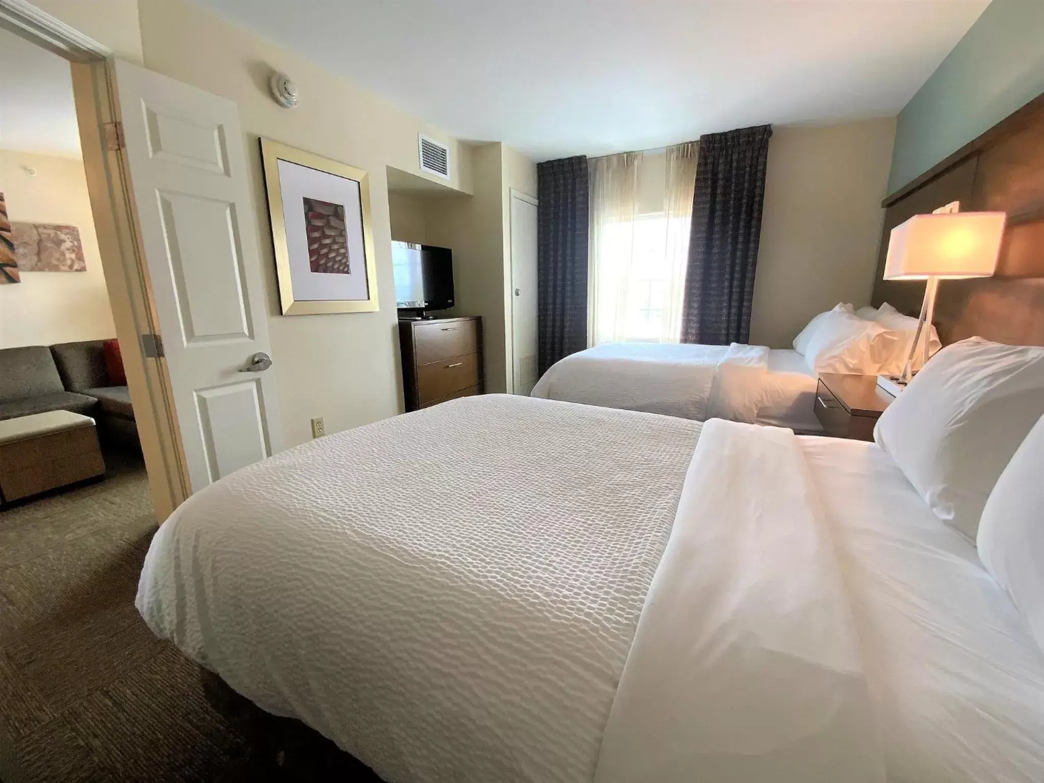 Photo of the whole room, Bed in Staybridge Suites Great Falls, an IHG Hotel
