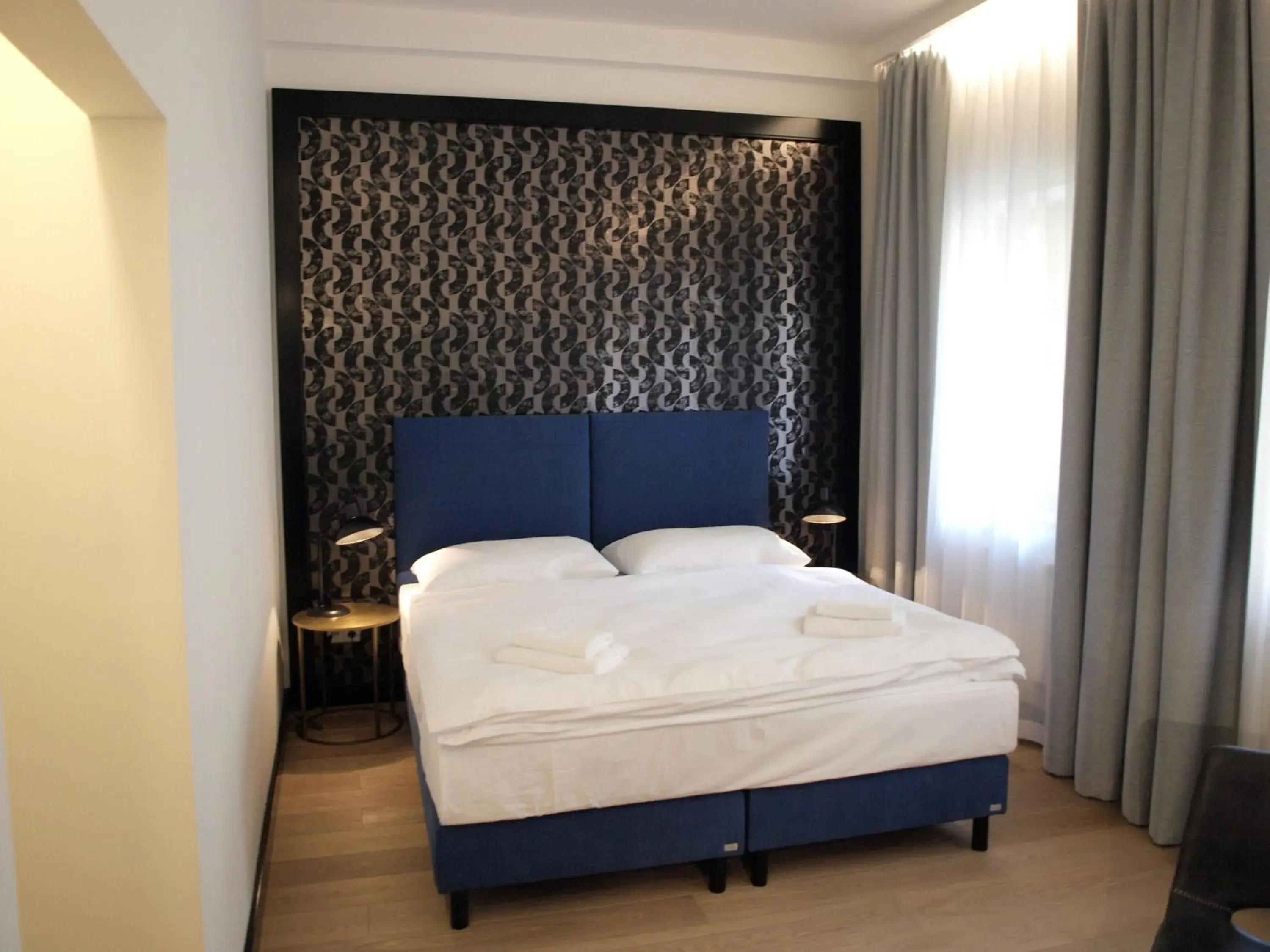 Bed in Antik Hotel Prague