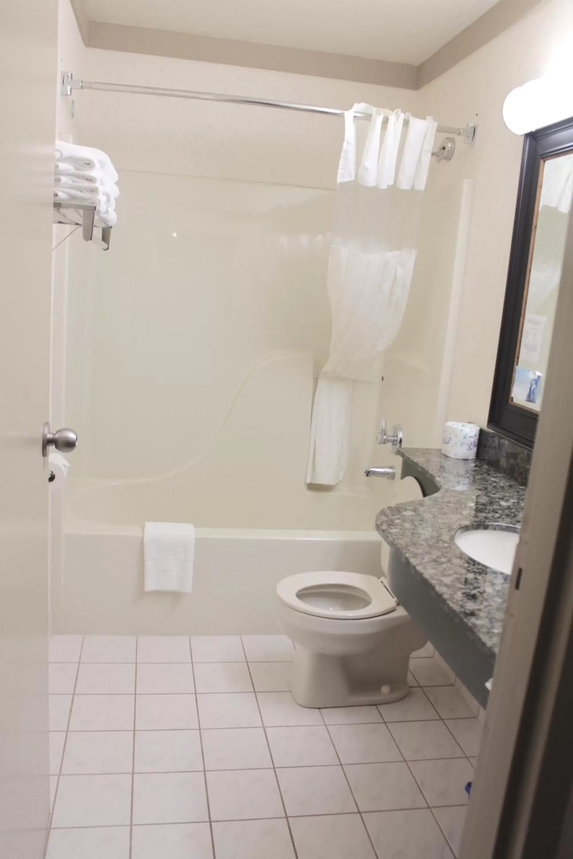 Bathroom in Days Inn & Suites by Wyndham Sault Ste. Marie ON