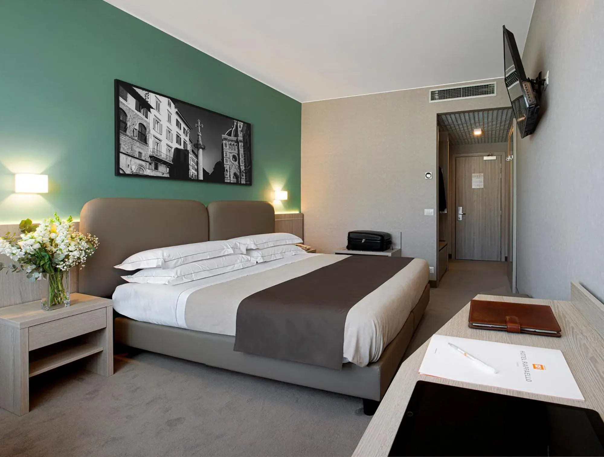 Bed in Hotel Raffaello
