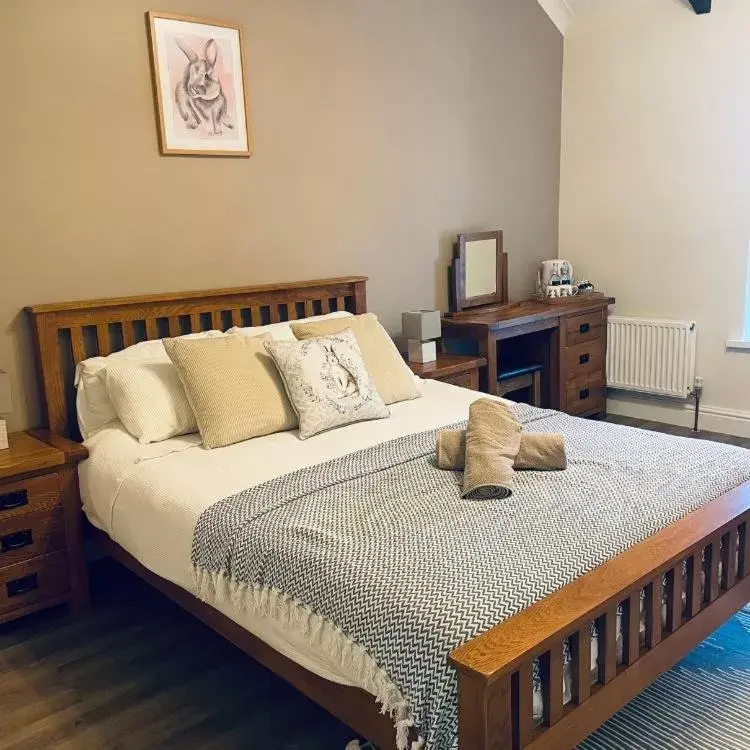 Bed in The Cottage Inn