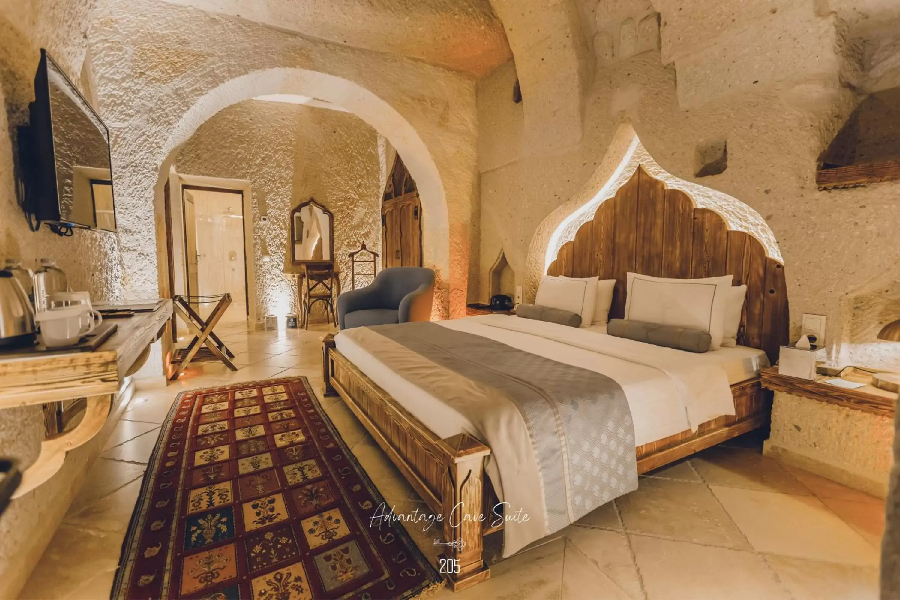 Bed in Nino Cave Suites