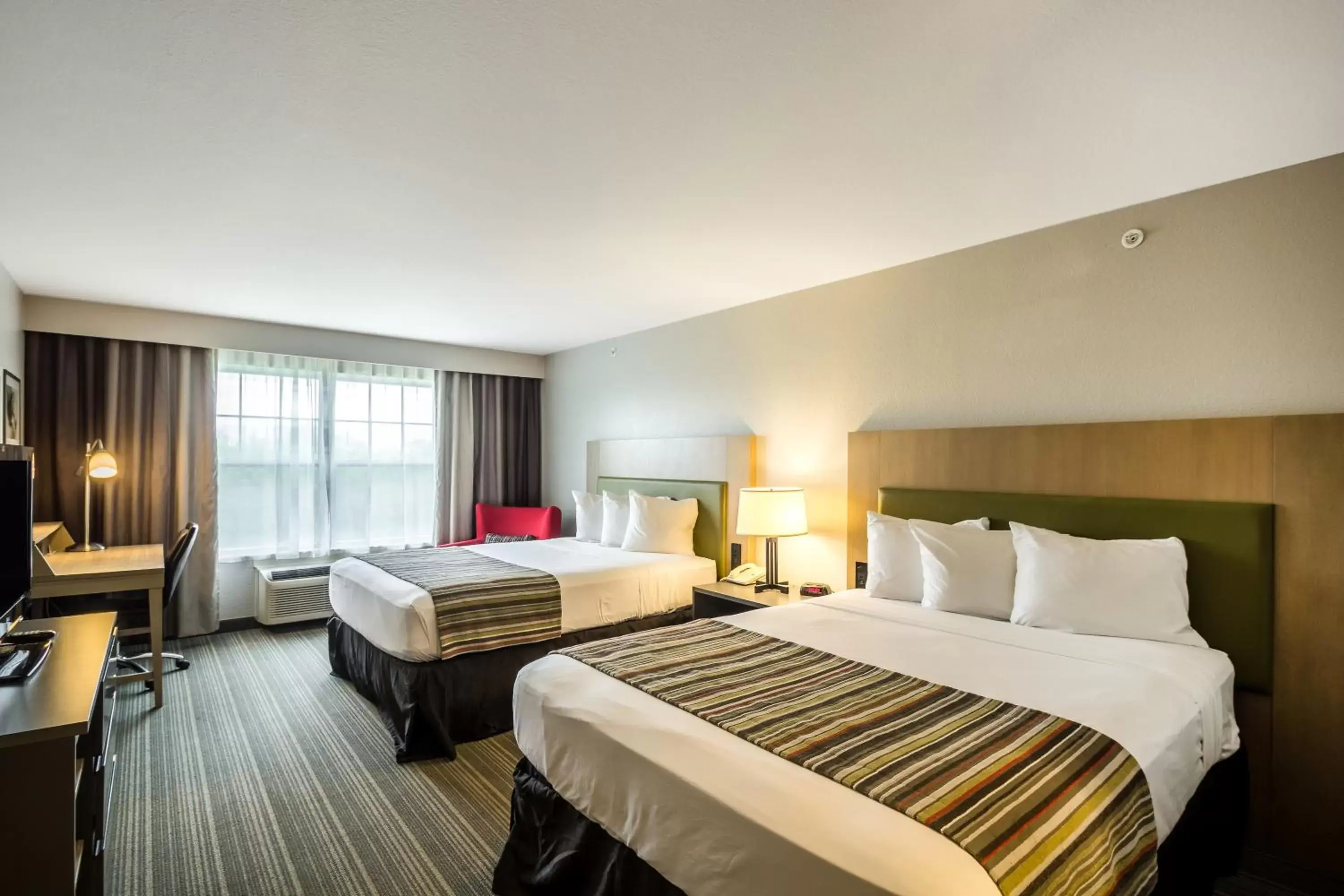 Queen Room with Two Queen Beds in Country Inn & Suites by Radisson, Fond du Lac, WI Queen Room with Two Queen Beds in Country Inn & Suites by Radisson, Fond du Lac, WI