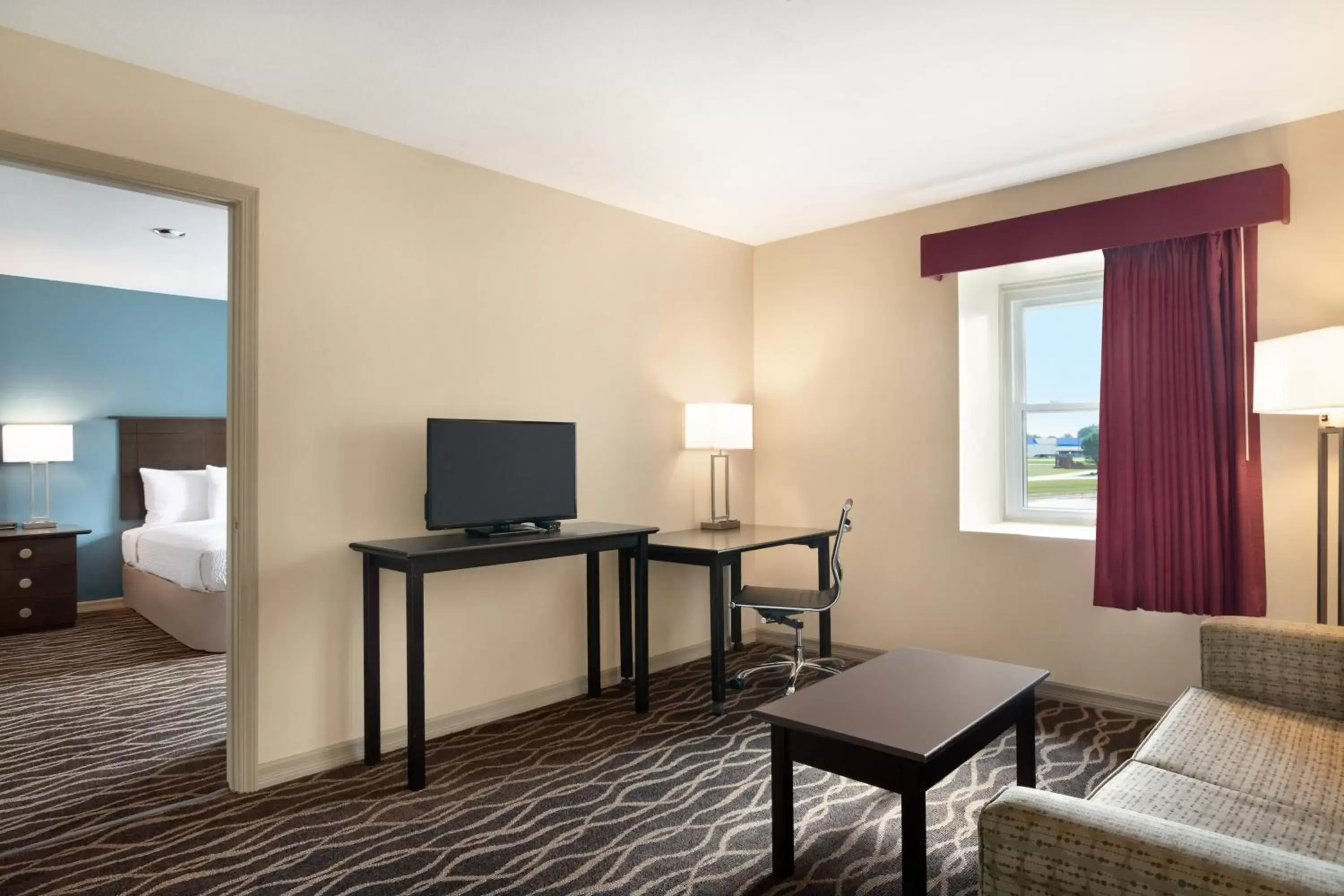 TV/Entertainment Center in Days Inn and Suites by Wyndham Sikeston