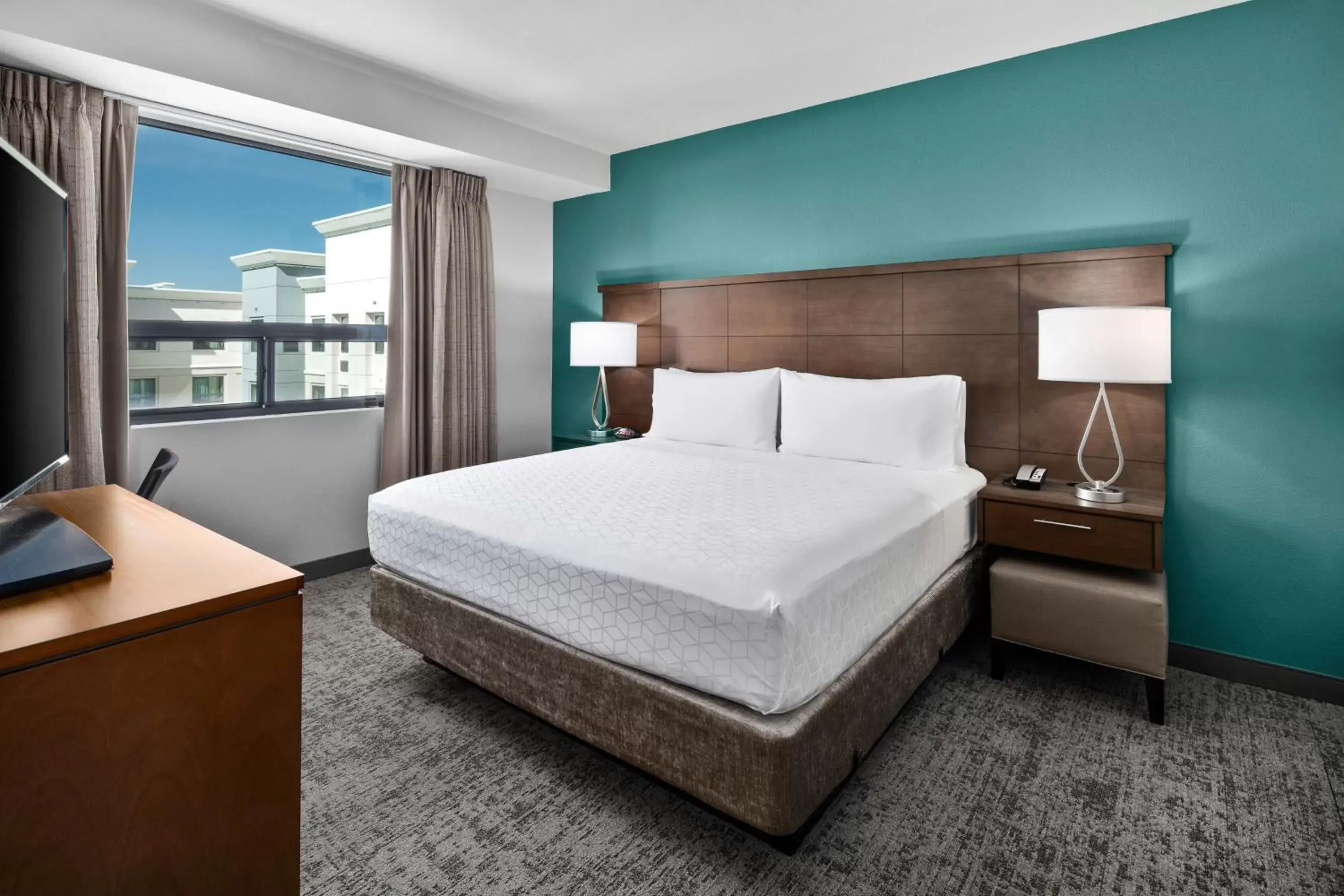 Bed in Staybridge Suites Irvine - John Wayne Airport, an IHG Hotel