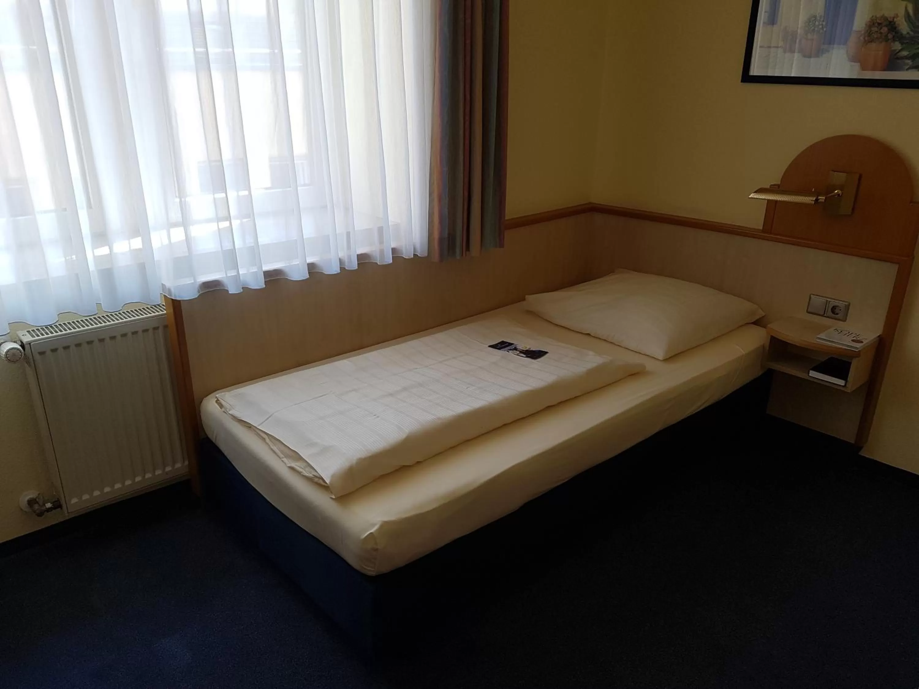 Photo of the whole room, Bed in City Partner Hotel Strauss