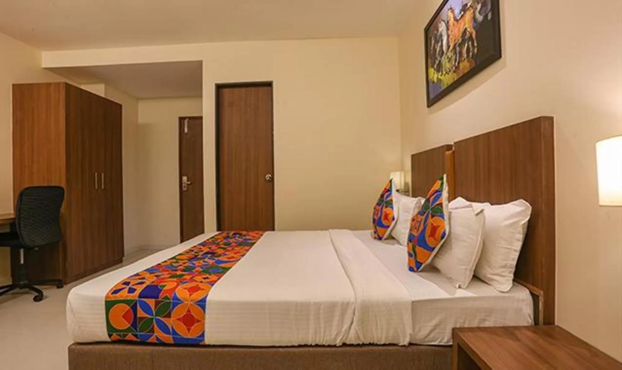 Bed in FabHotel Royal Mumbai International Airport