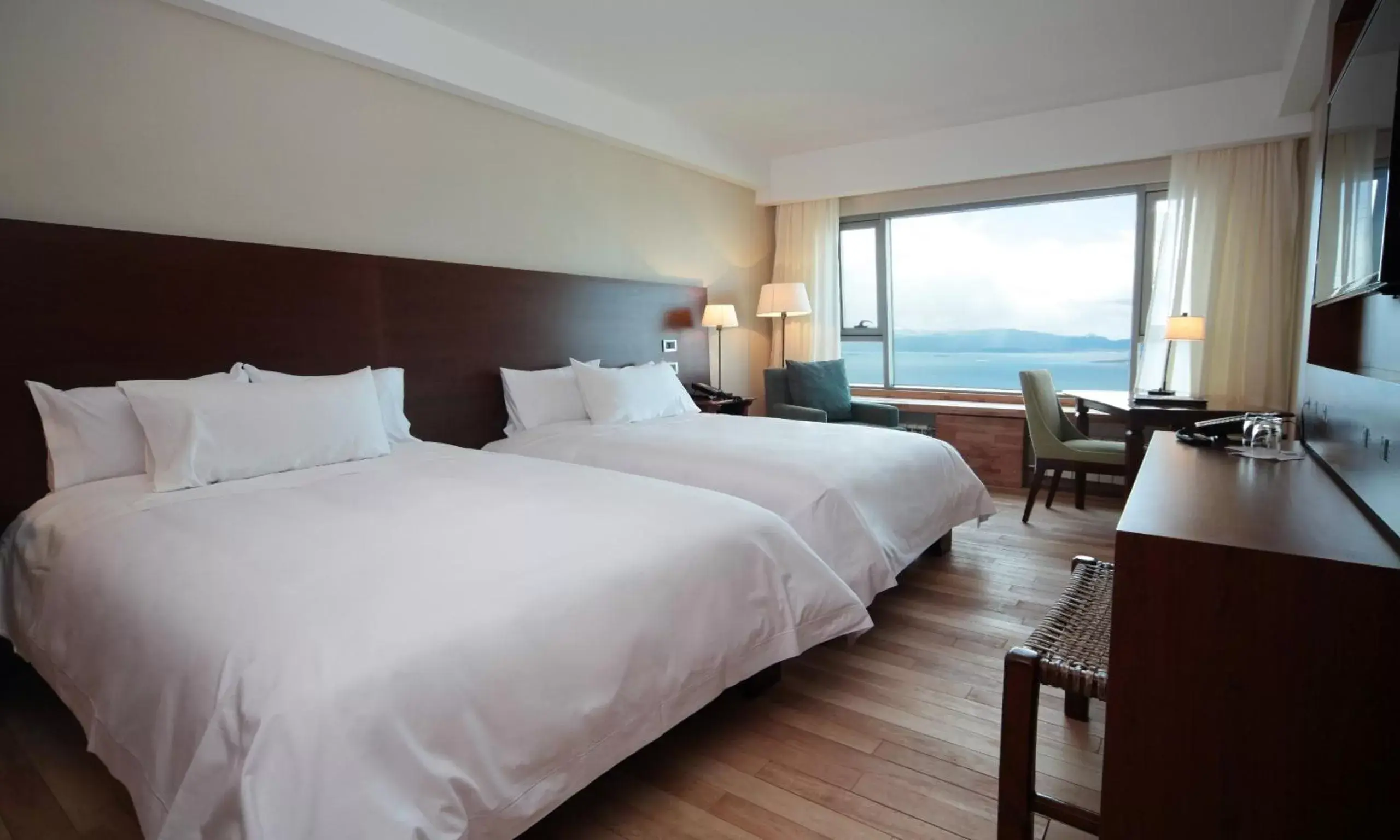 Photo of the whole room, Bed in Arakur Ushuaia Resort & Spa