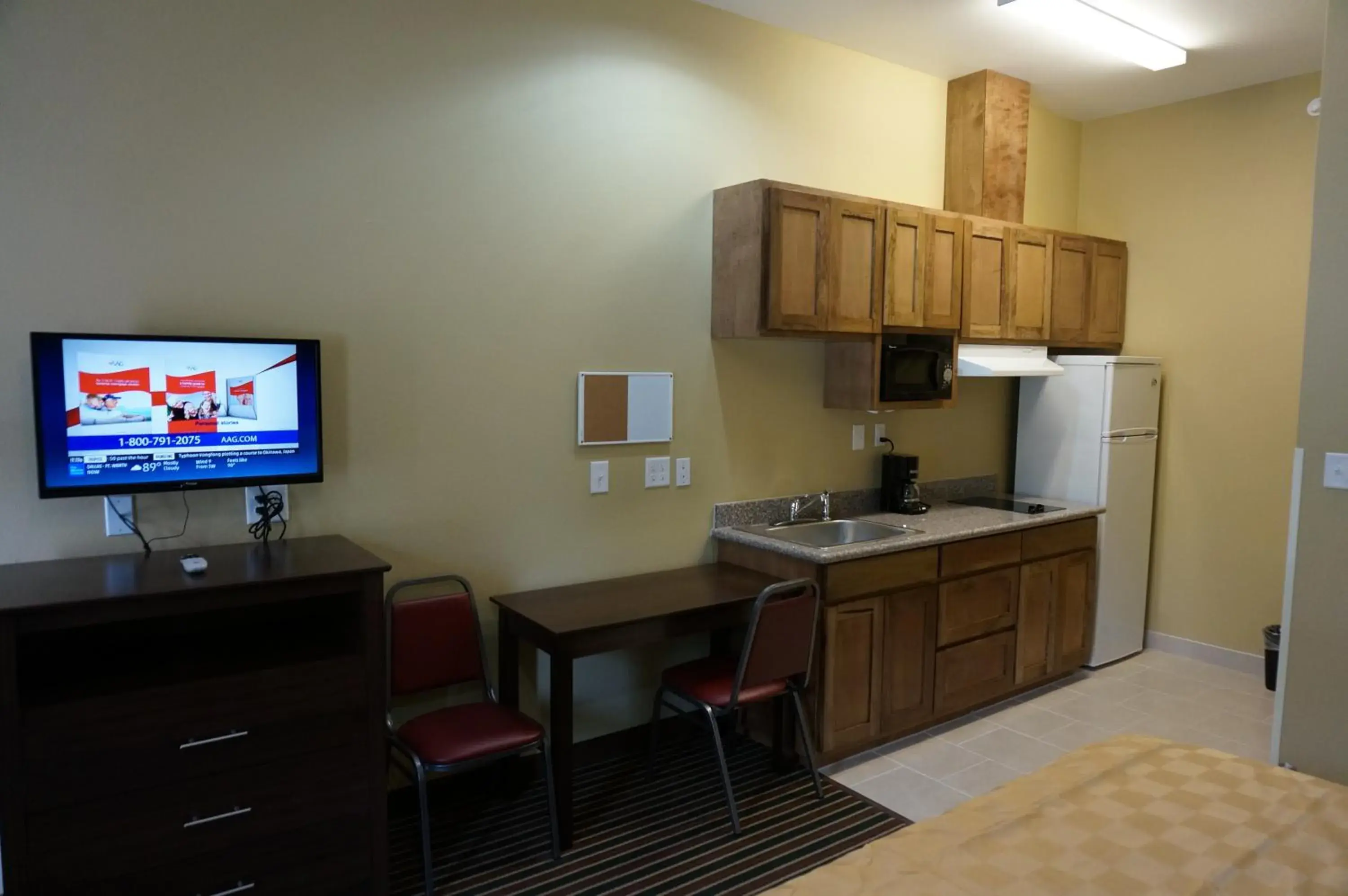 TV and multimedia, Kitchen/Kitchenette in The Bungalows Hotel & Event Center at Lakeline Austin / Cedar Park