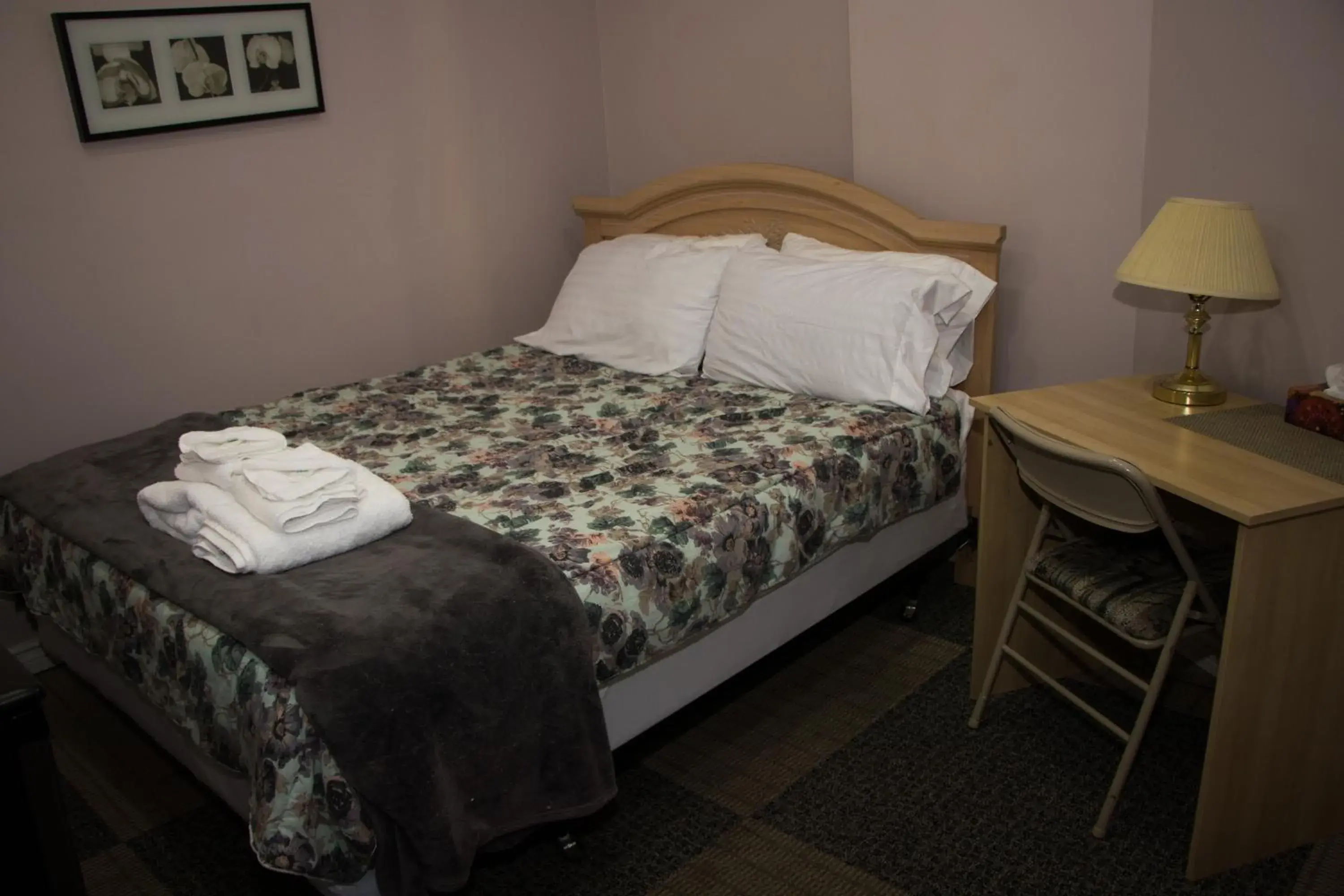 Bed in Saint Lawrence Residences and Suites