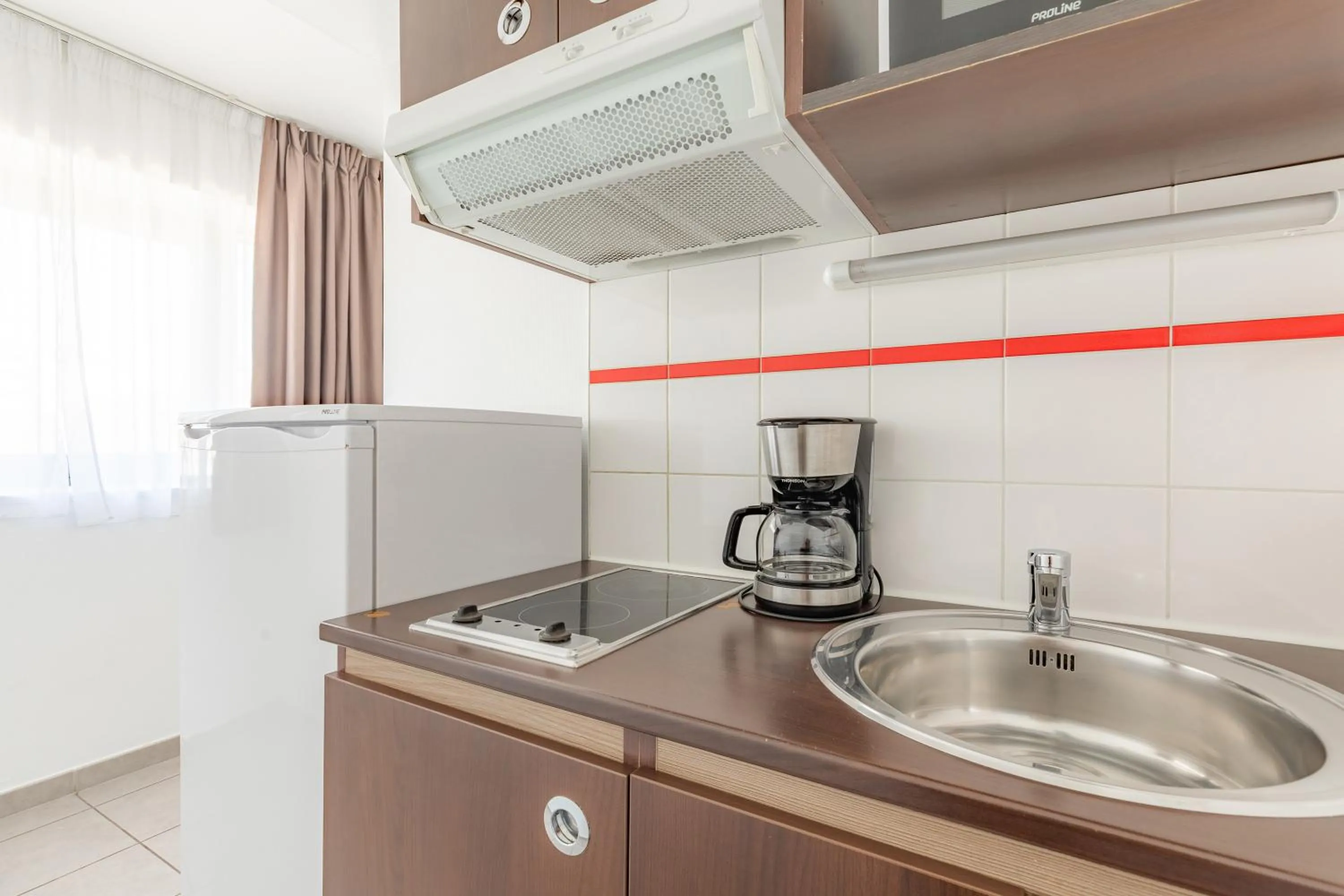 Kitchen or kitchenette in Appart'City Classic Chalon sur Saone