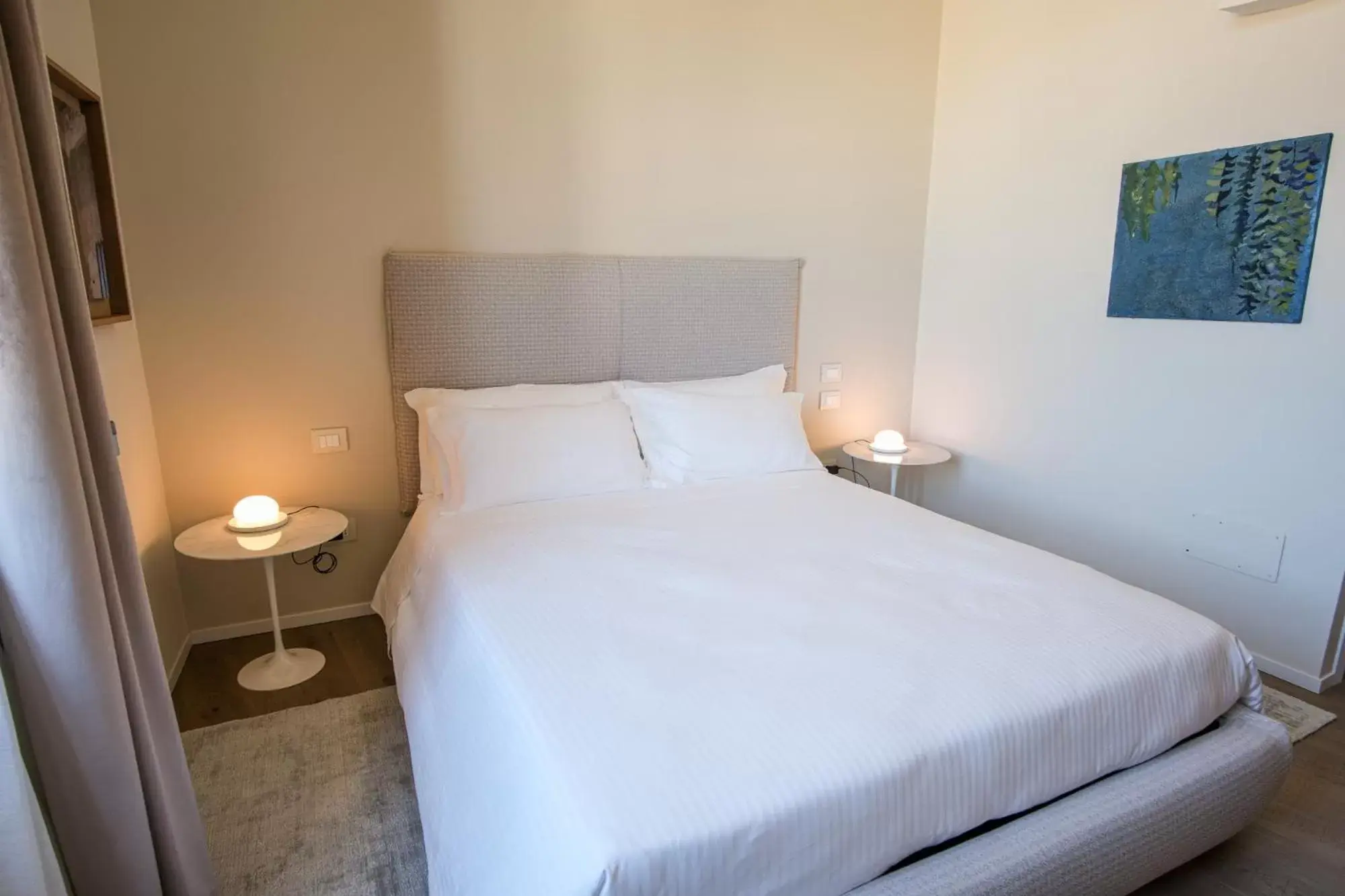 Bed in Dimora de Matera Luxury Suites