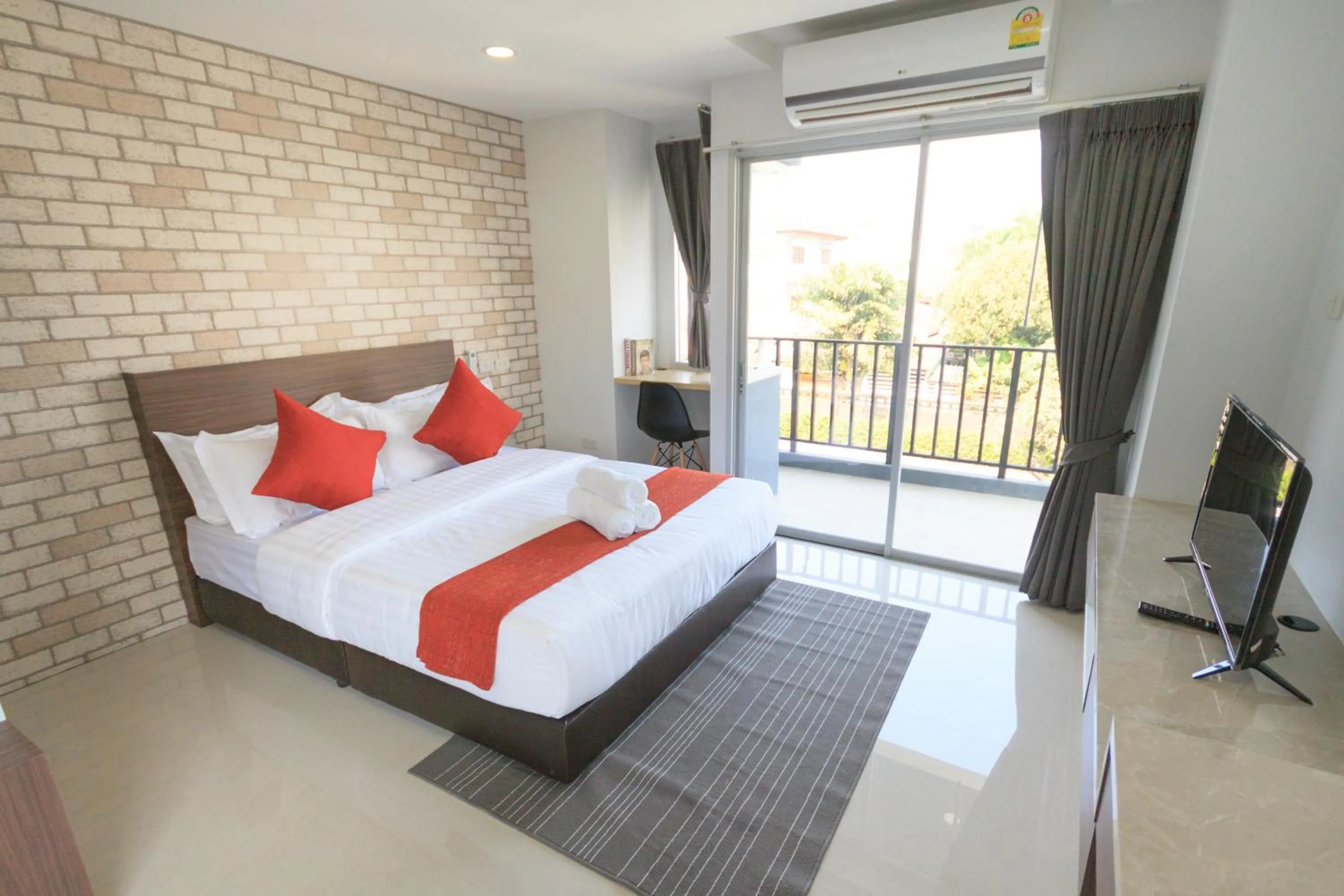 Bed in Q Space Residence