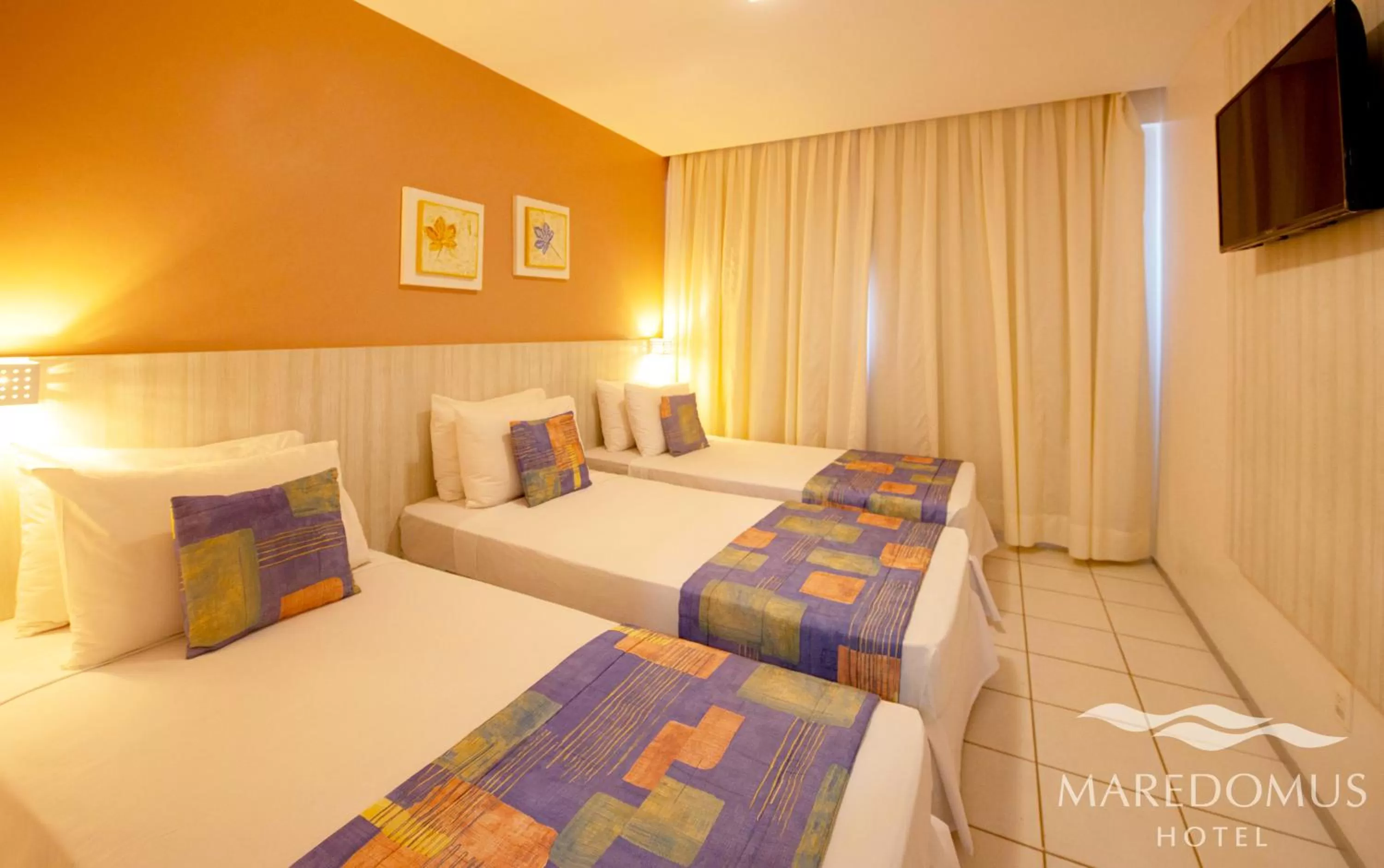 Bed in Maredomus Hotel