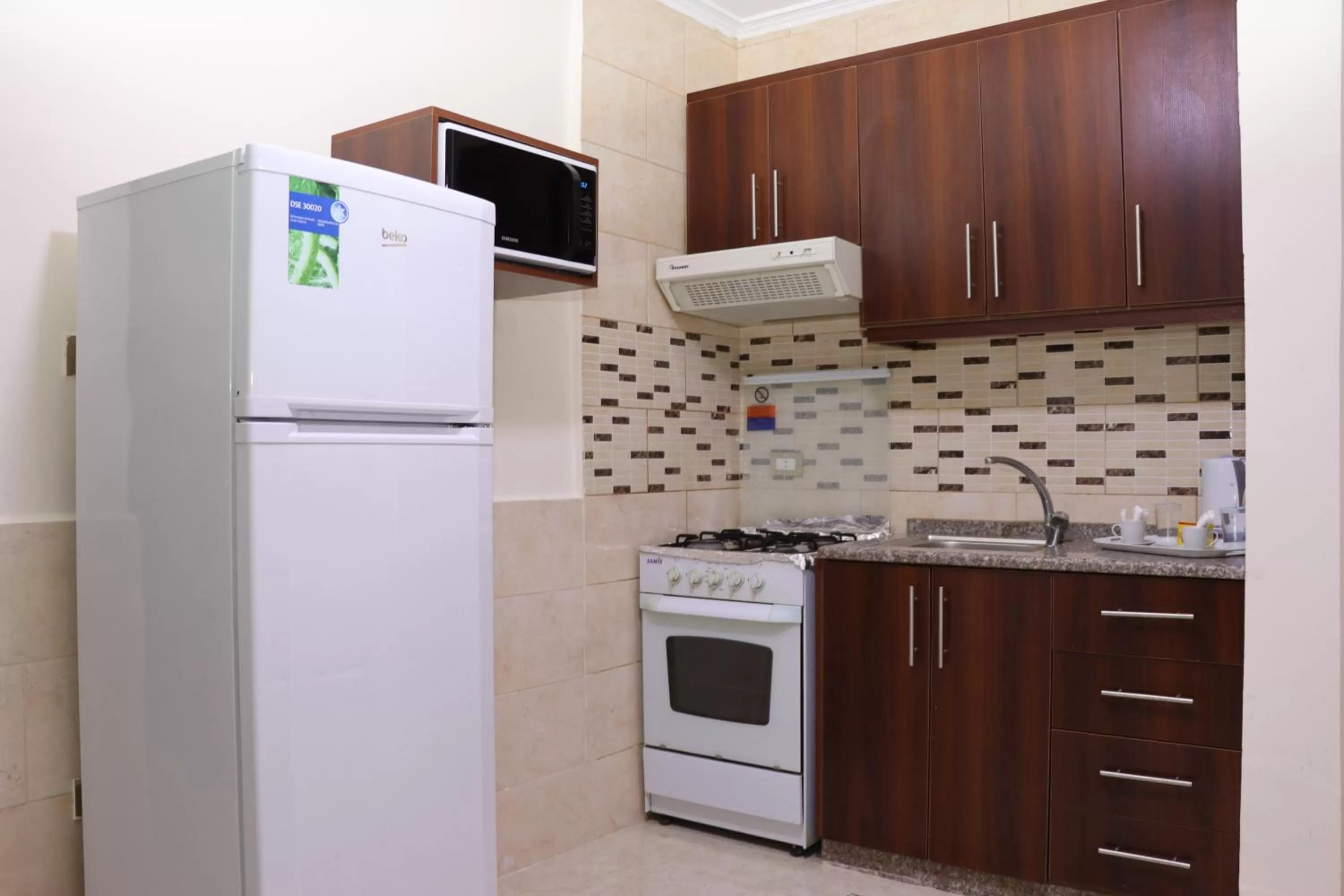 Kitchen or kitchenette in Al Jamal Suites