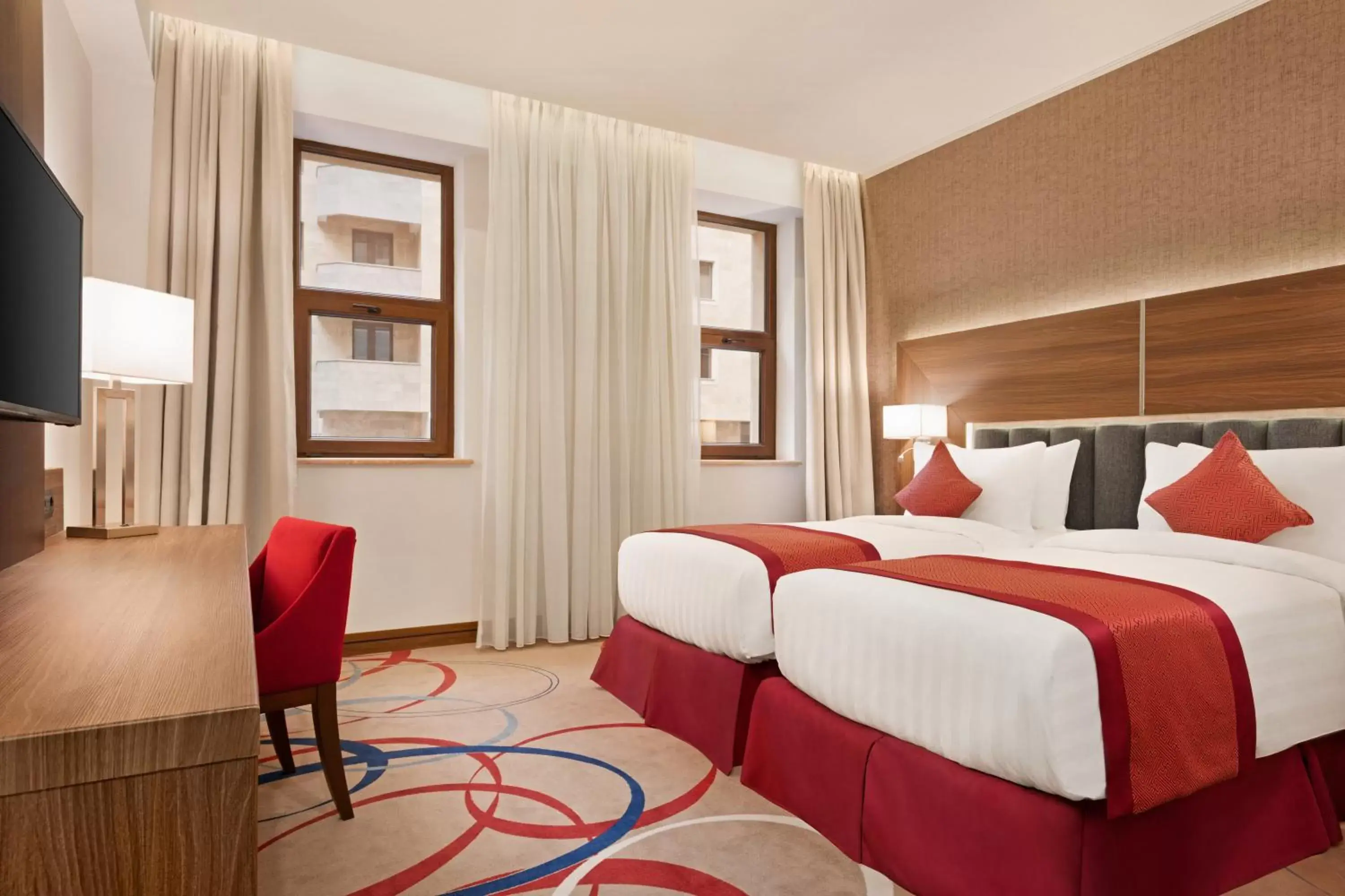 Bed in Ramada Hotel & Suites by Wyndham Yerevan