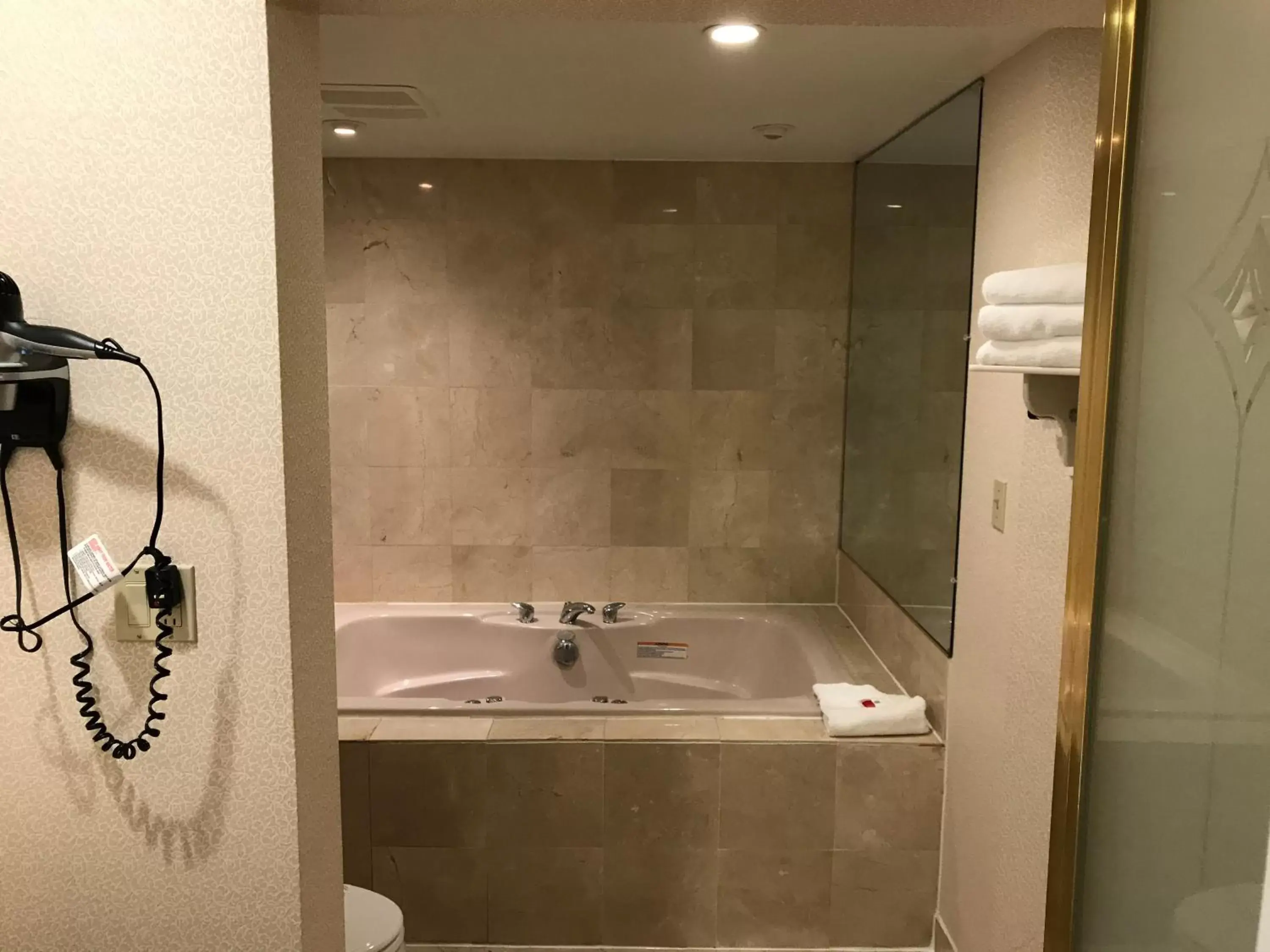 Bathroom in Super 8 by Wyndham Sturbridge