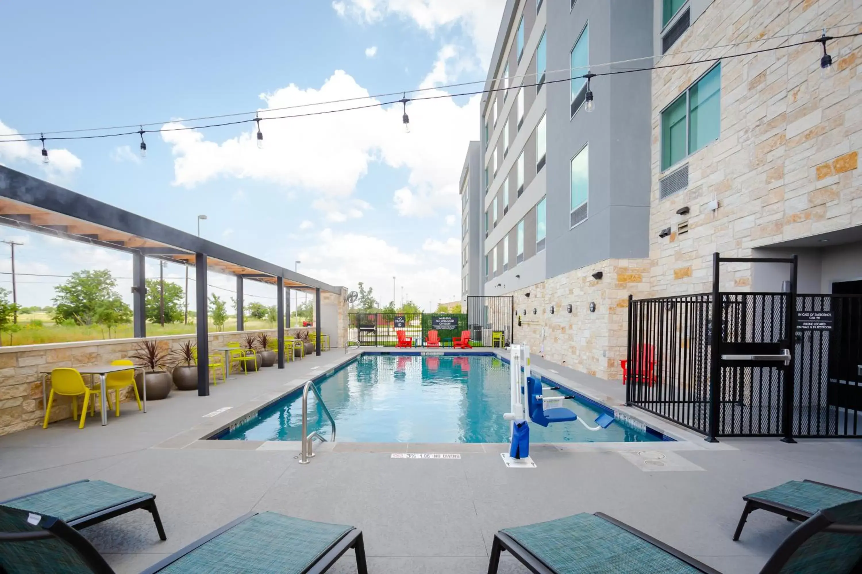 Patio, Swimming Pool in Home2 Suites by Hilton Pflugerville, TX